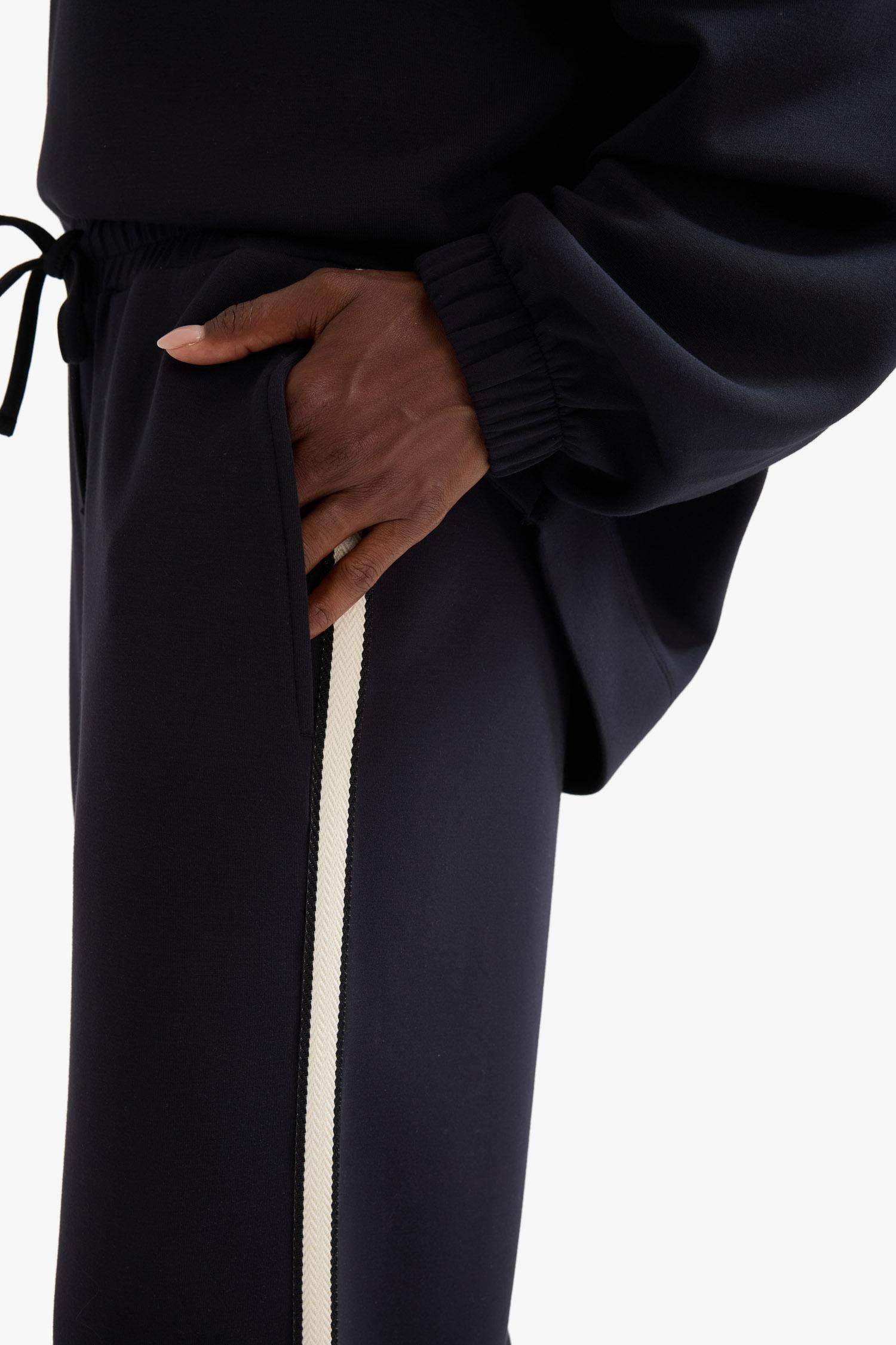 بنطلون نسيج مشروط وايد ليج برجل واسع بجيب