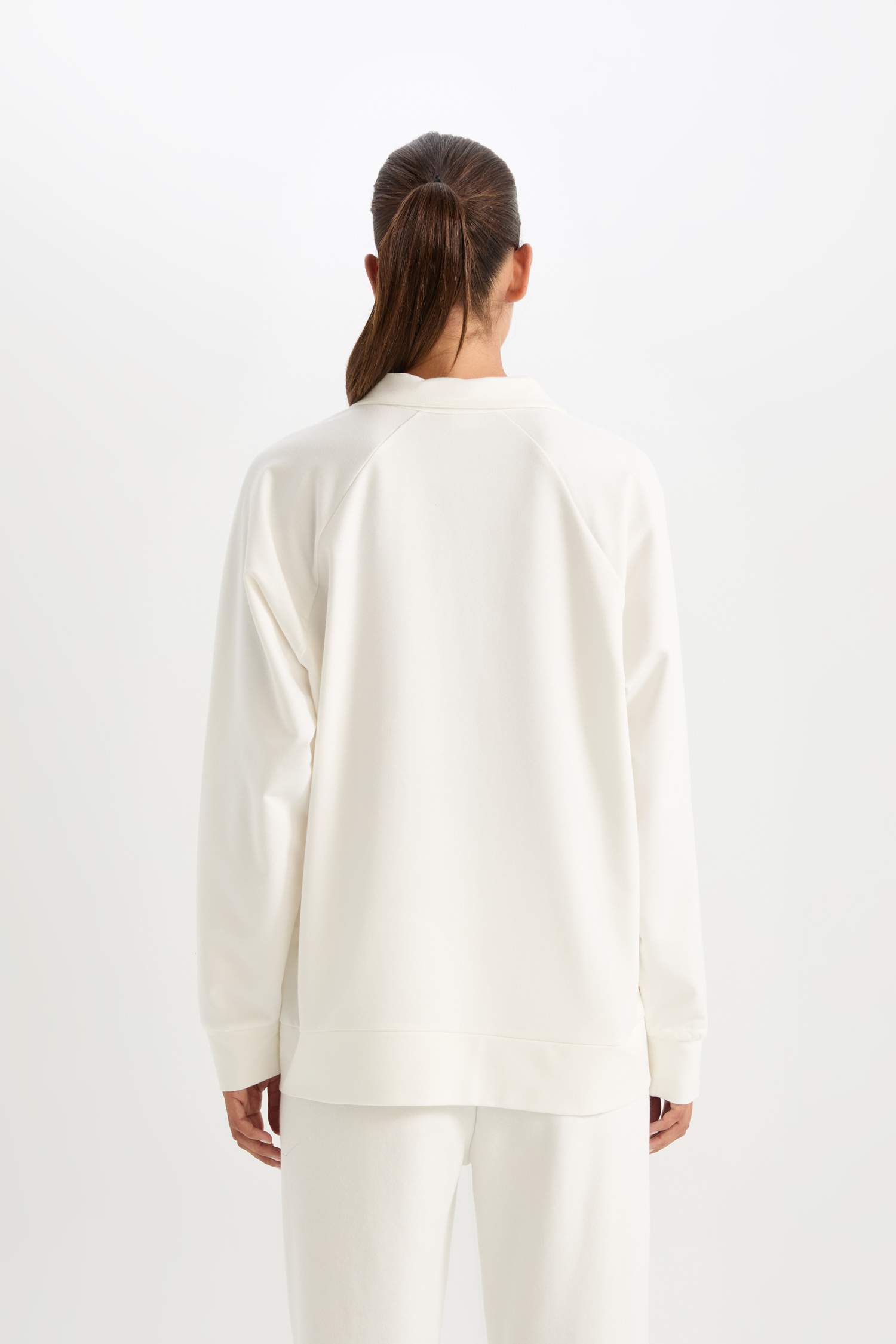 سويت شيرت رياضي اوفر سايز بياقة بولو من DeFactoFit