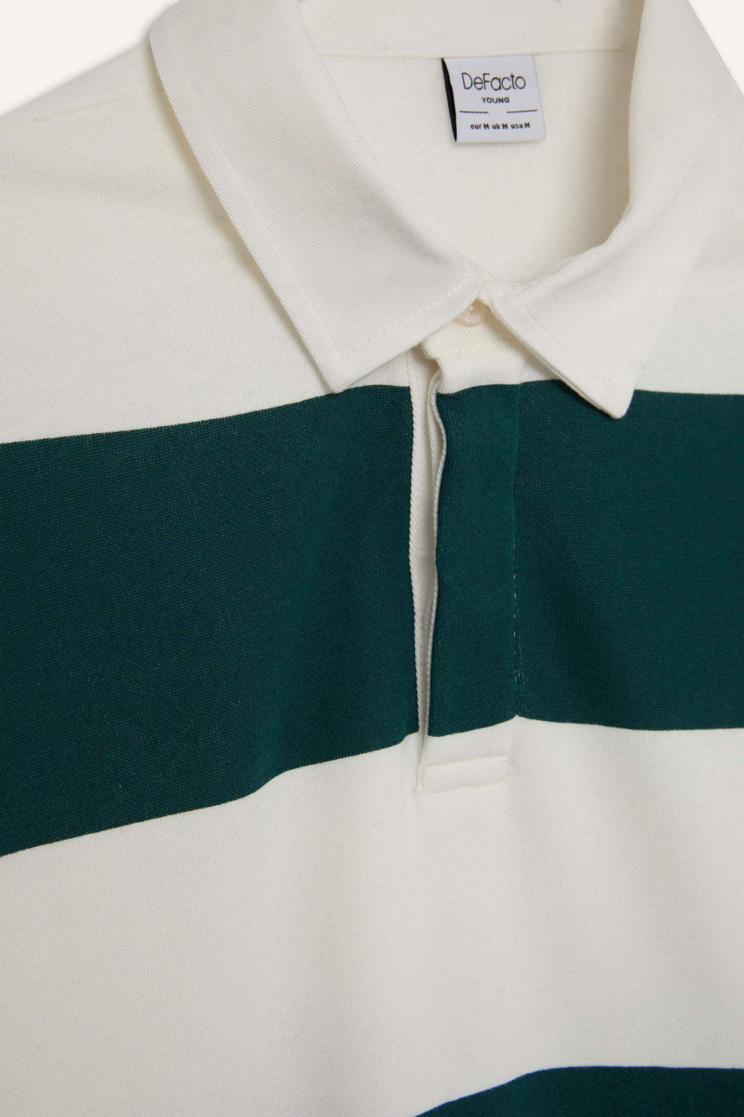 سويت شيرت مخطط أوفر سايز بياقة بولو