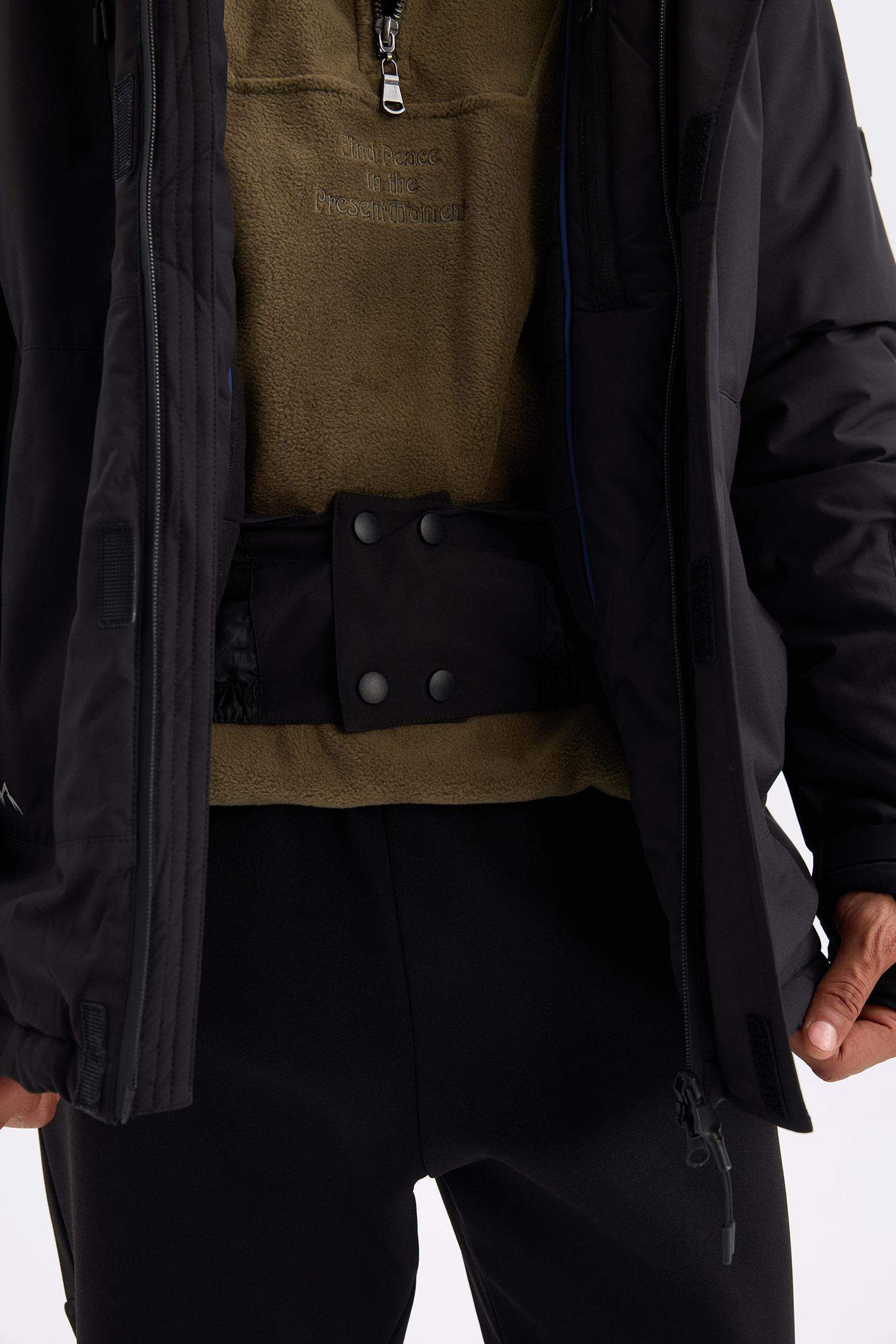 DeFactoFit Su İtici Rüzgar Geçirmez Kapüşonlu Polar Astarlı Ultra Korumalı Sıcak Tutan Kayak Montu