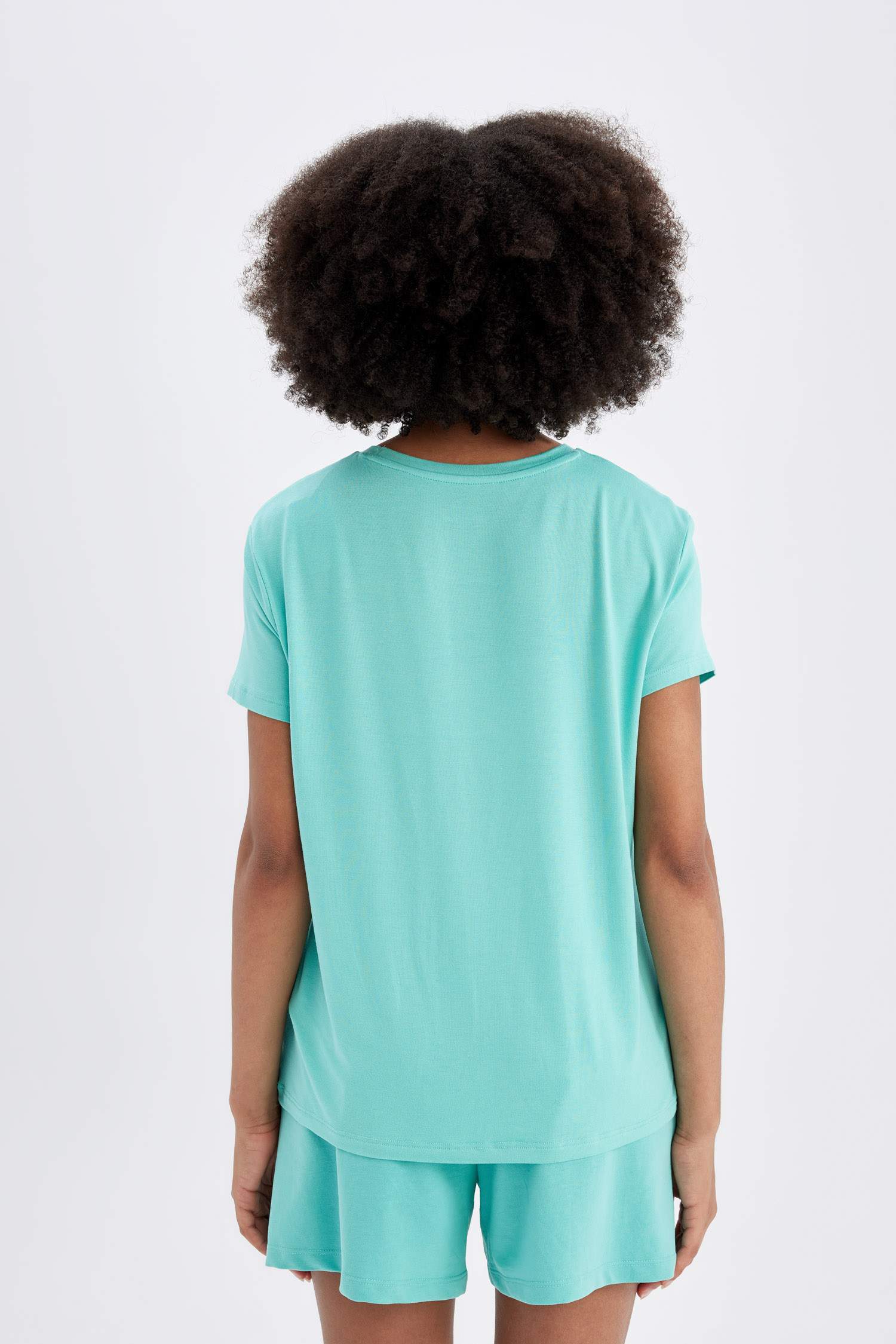 تيشيرت رياضي نص كم قصة عادية برقبة مستديرة من DeFactoFit