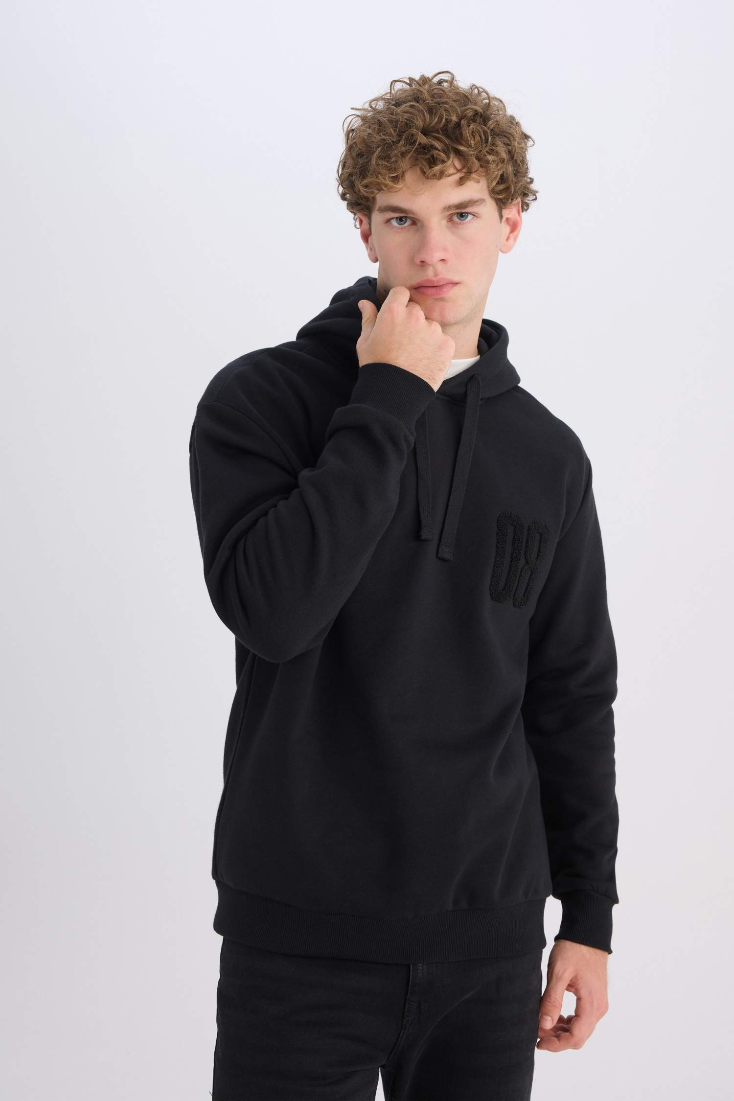 سويت شيرت قصة مريحة بغطاء للرأس