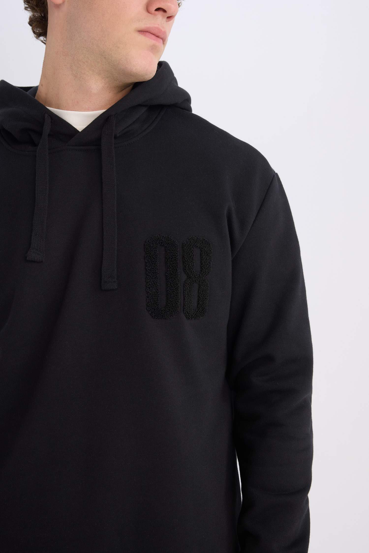 سويت شيرت قصة مريحة بغطاء للرأس