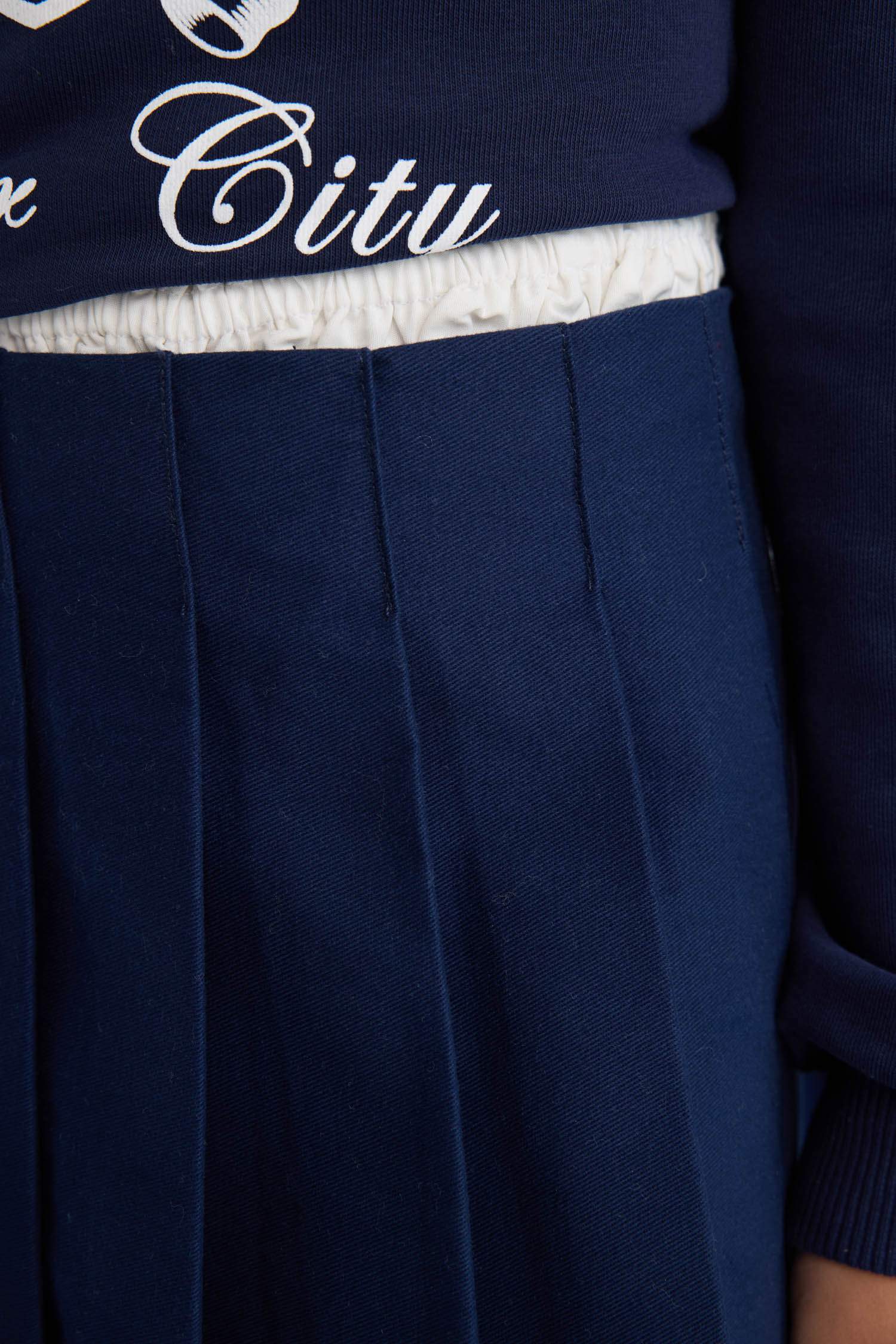 تنورة جبردين بناتي بكسرات وسحاب مخفي