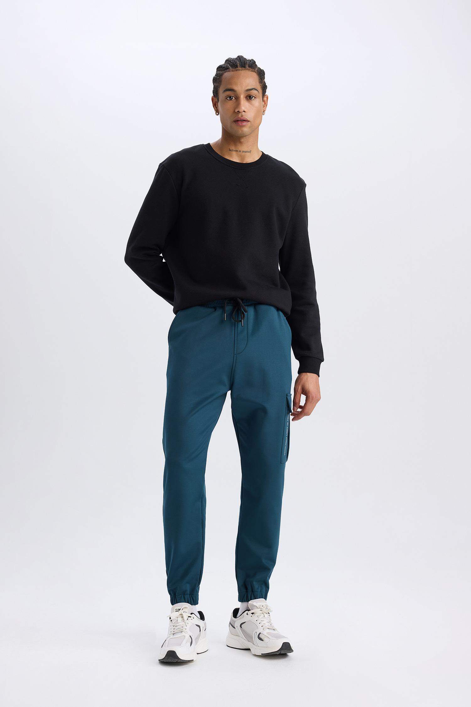 DeFactoFit Sporcu Jogger Eşofman Altı Standart Fit Üç Cepli Beli Bağcıklı Lastikli Paça