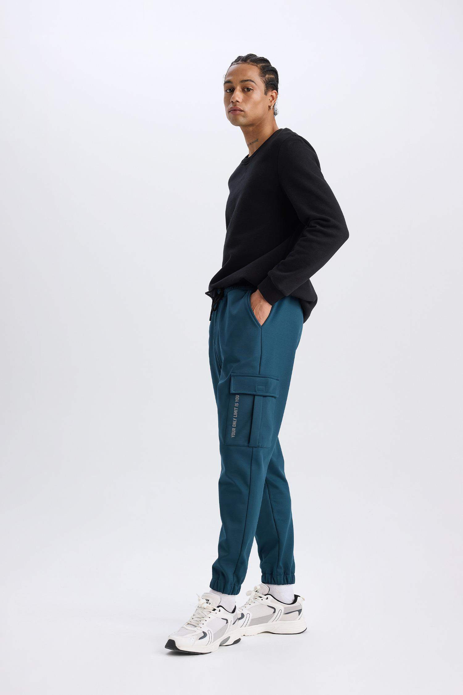 DeFactoFit Sporcu Jogger Eşofman Altı Standart Fit Üç Cepli Beli Bağcıklı Lastikli Paça