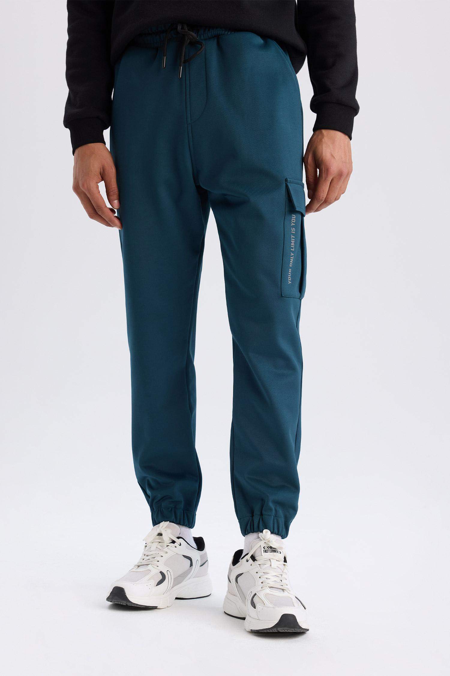 DeFactoFit Sporcu Jogger Eşofman Altı Standart Fit Üç Cepli Beli Bağcıklı Lastikli Paça