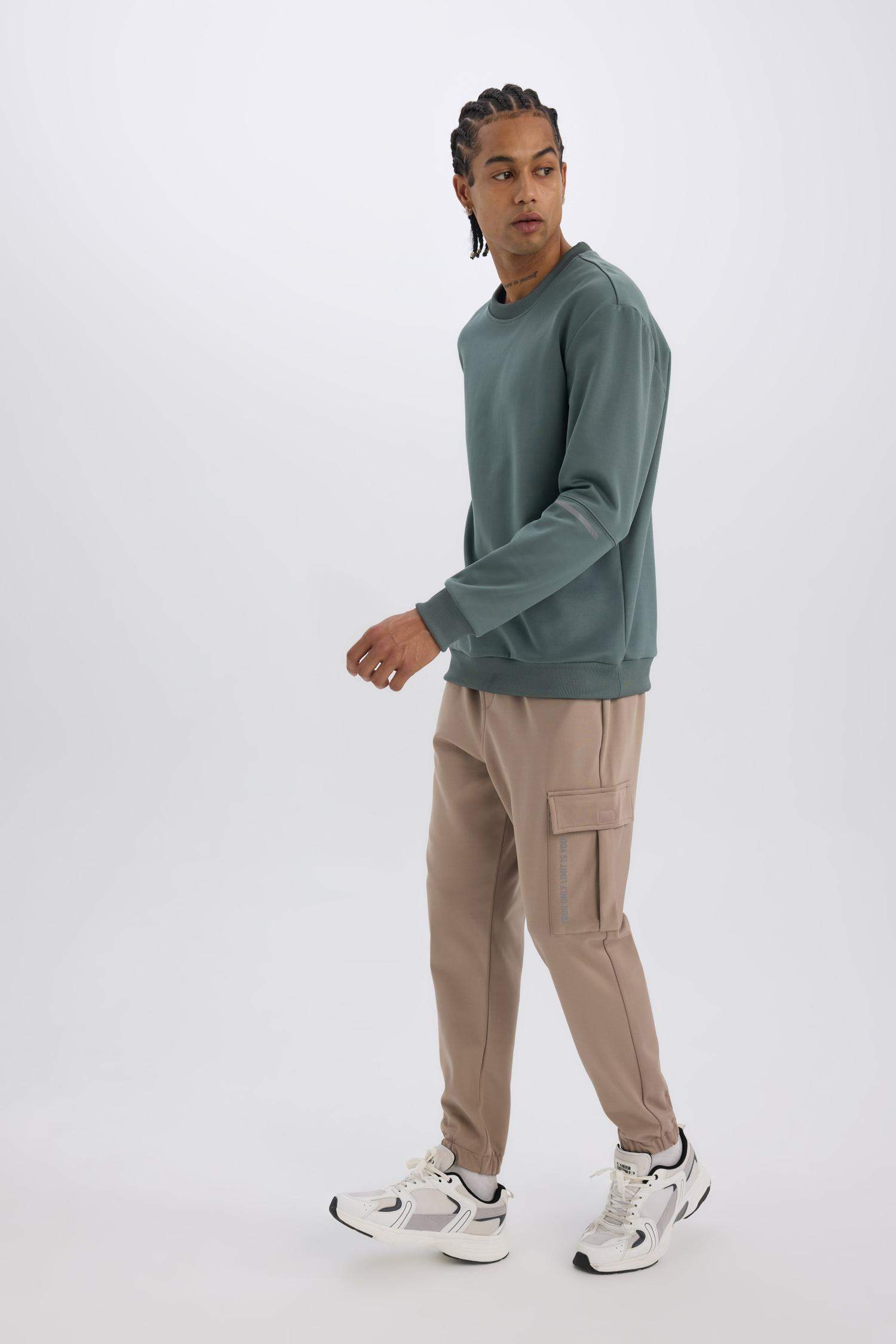 DeFactoFit Sporcu Jogger Eşofman Altı Standart Fit Üç Cepli Beli Bağcıklı Lastikli Paça