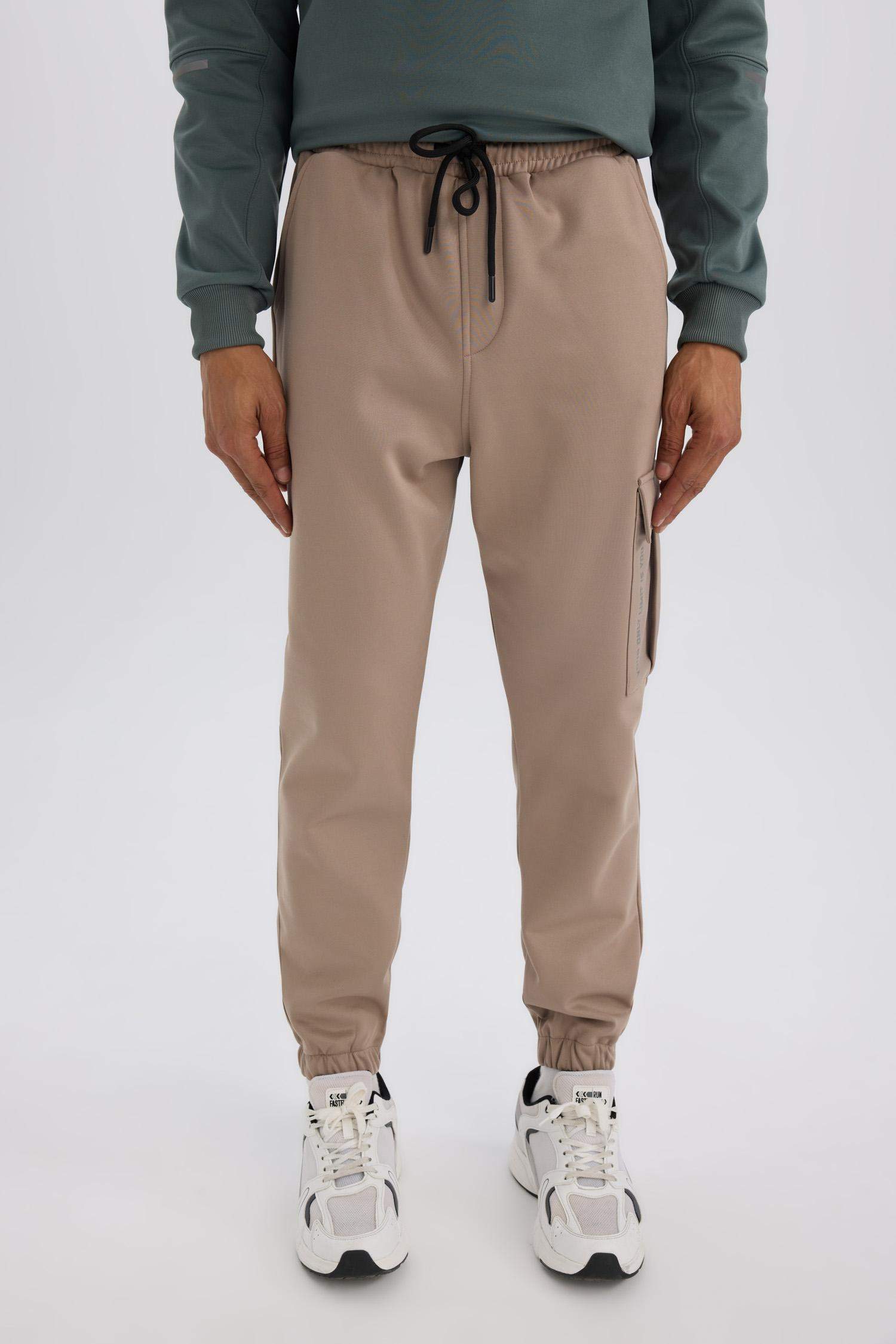 DeFactoFit Sporcu Jogger Eşofman Altı Standart Fit Üç Cepli Beli Bağcıklı Lastikli Paça