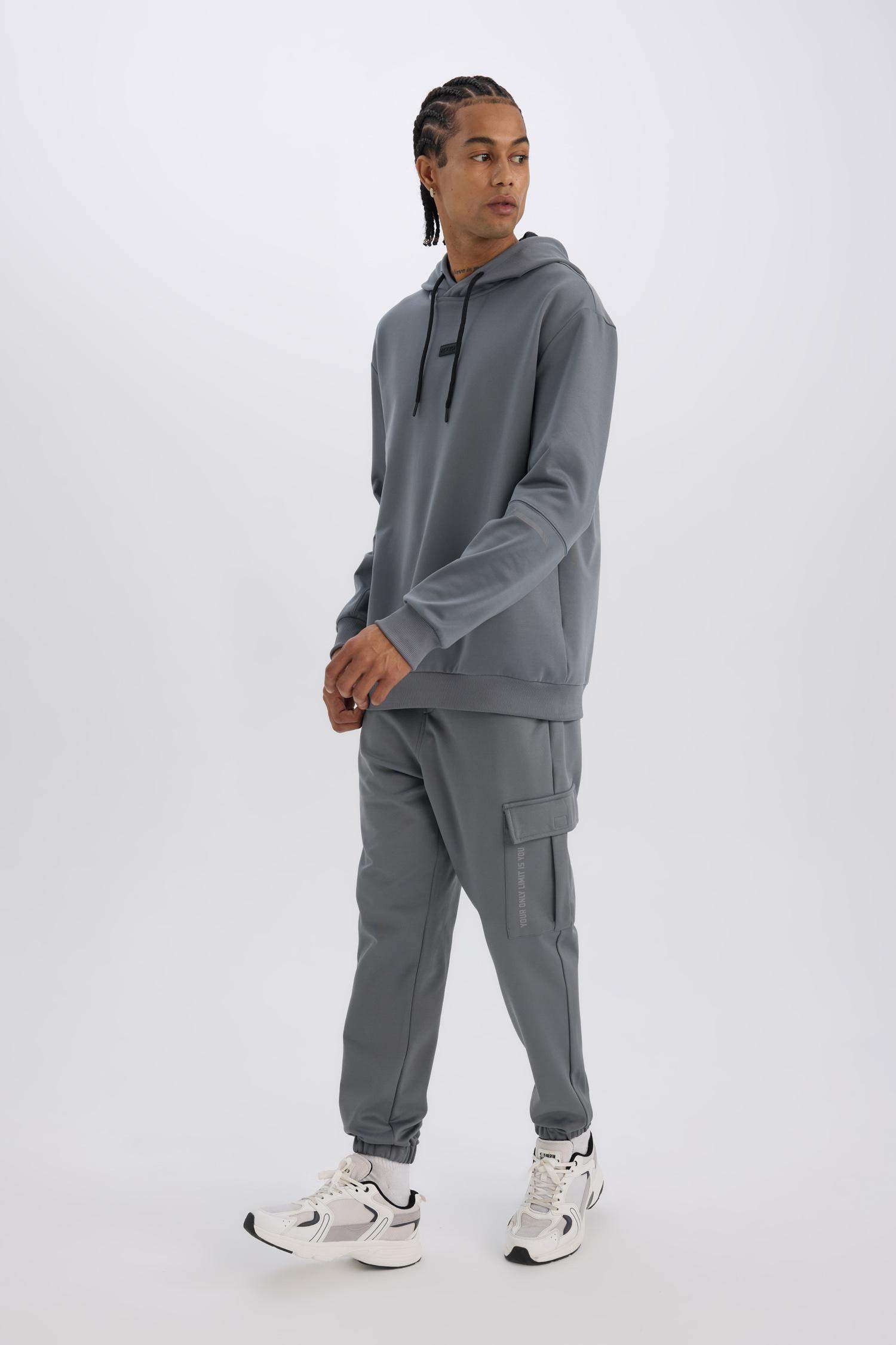 DeFactoFit Sporcu Jogger Eşofman Altı Standart Fit Üç Cepli Beli Bağcıklı Lastikli Paça