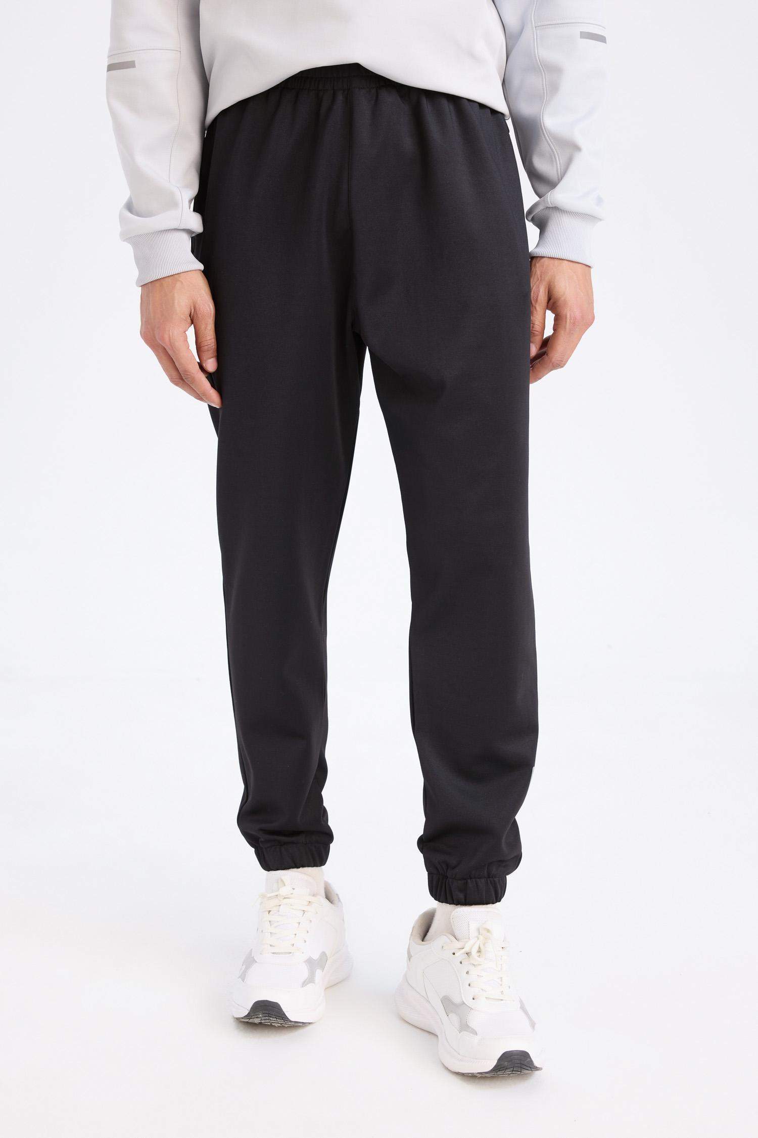 DeFactoFit Standart Fit Sporcu Jogger Eşofman Altı Cepli Beli Paçası Lastikli