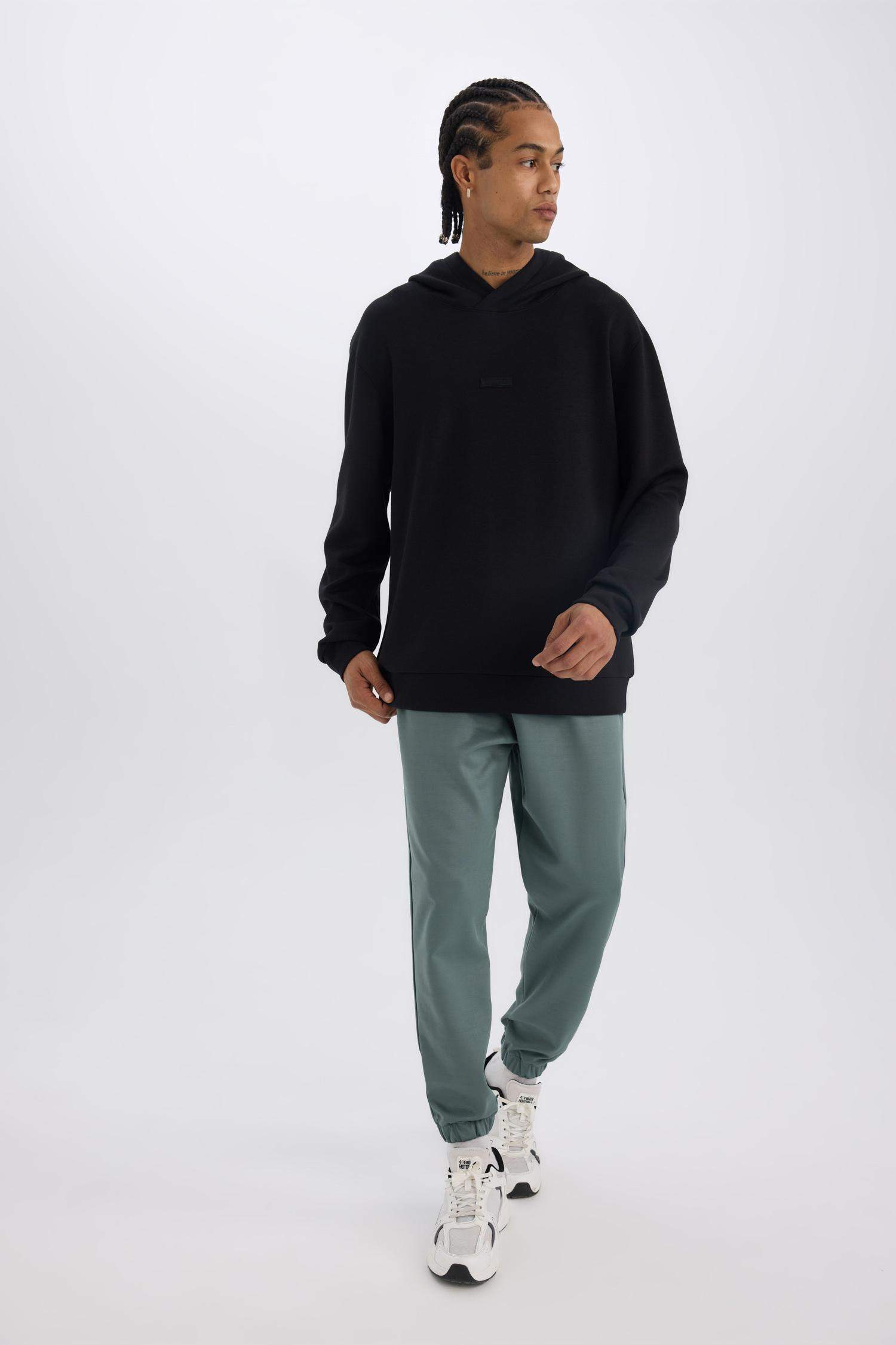 DeFactoFit Sporcu Jogger Eşofman Altı Standart Fit Basic Düz Cepli Beli Paçası Lastikli