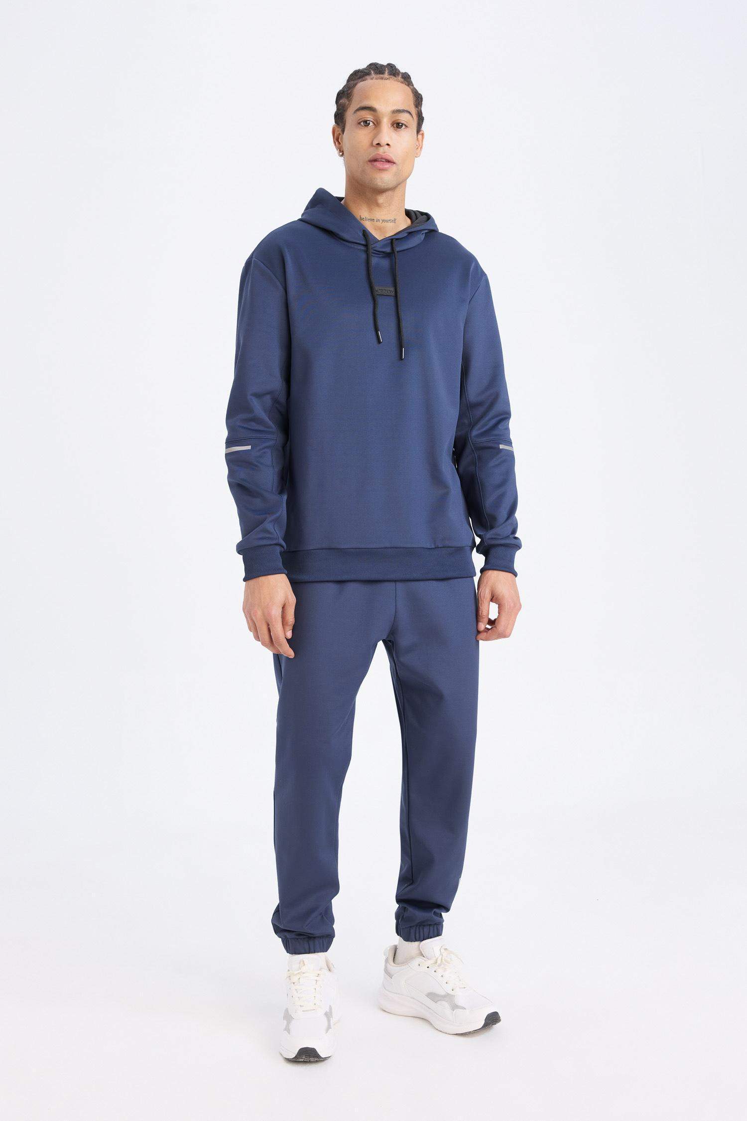 DeFactoFit Sporcu Jogger Eşofman Altı Standart Fit Basic Düz Cepli Beli Paçası Lastikli