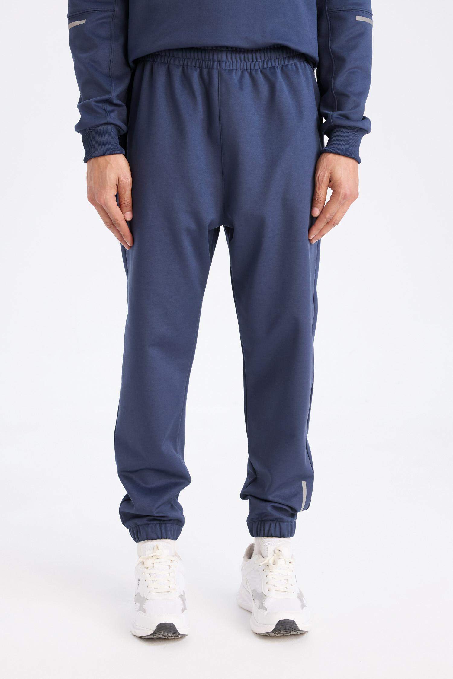 DeFactoFit Sporcu Jogger Eşofman Altı Standart Fit Basic Düz Cepli Beli Paçası Lastikli