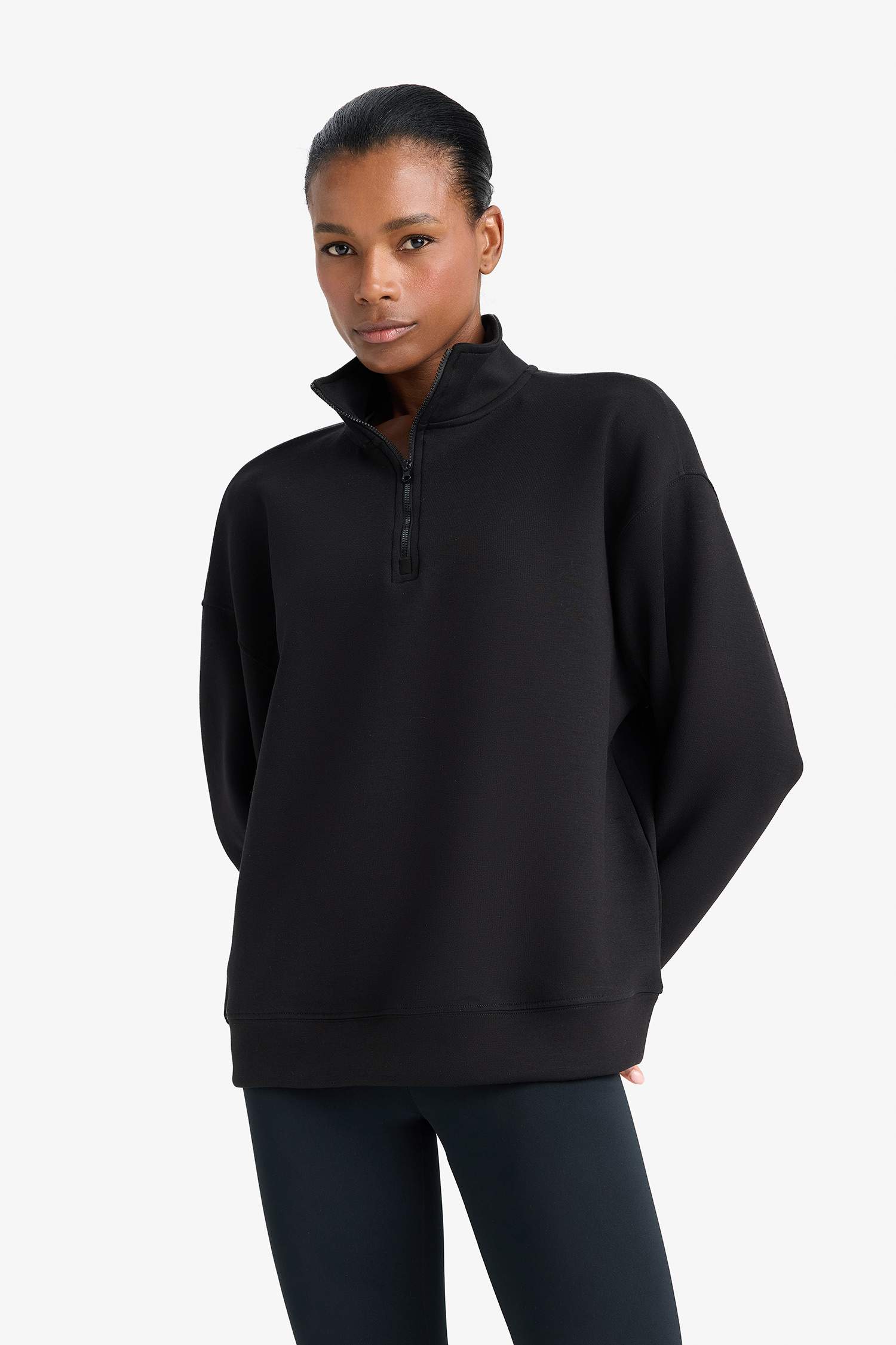 سويت شيرت رياضي اوفر سايز بياقة عالية من DeFactoFit