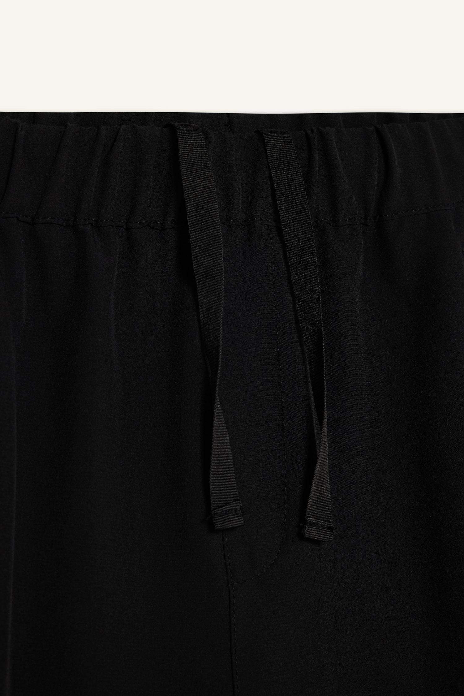 DeFactoFit Sporcu Jogger Eşofman Altı Slim Fit Dar Kesim Dokuma Kargo Cepli Standart Paça