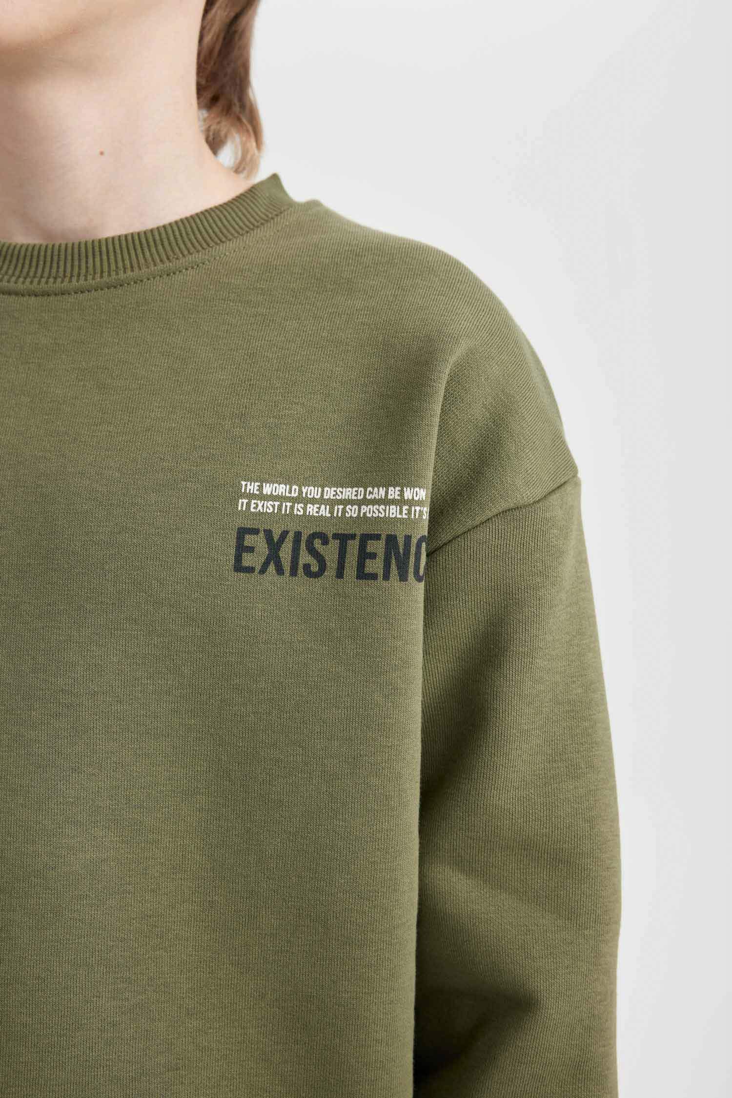 سويت شيرت واسع برقبة مستديرة