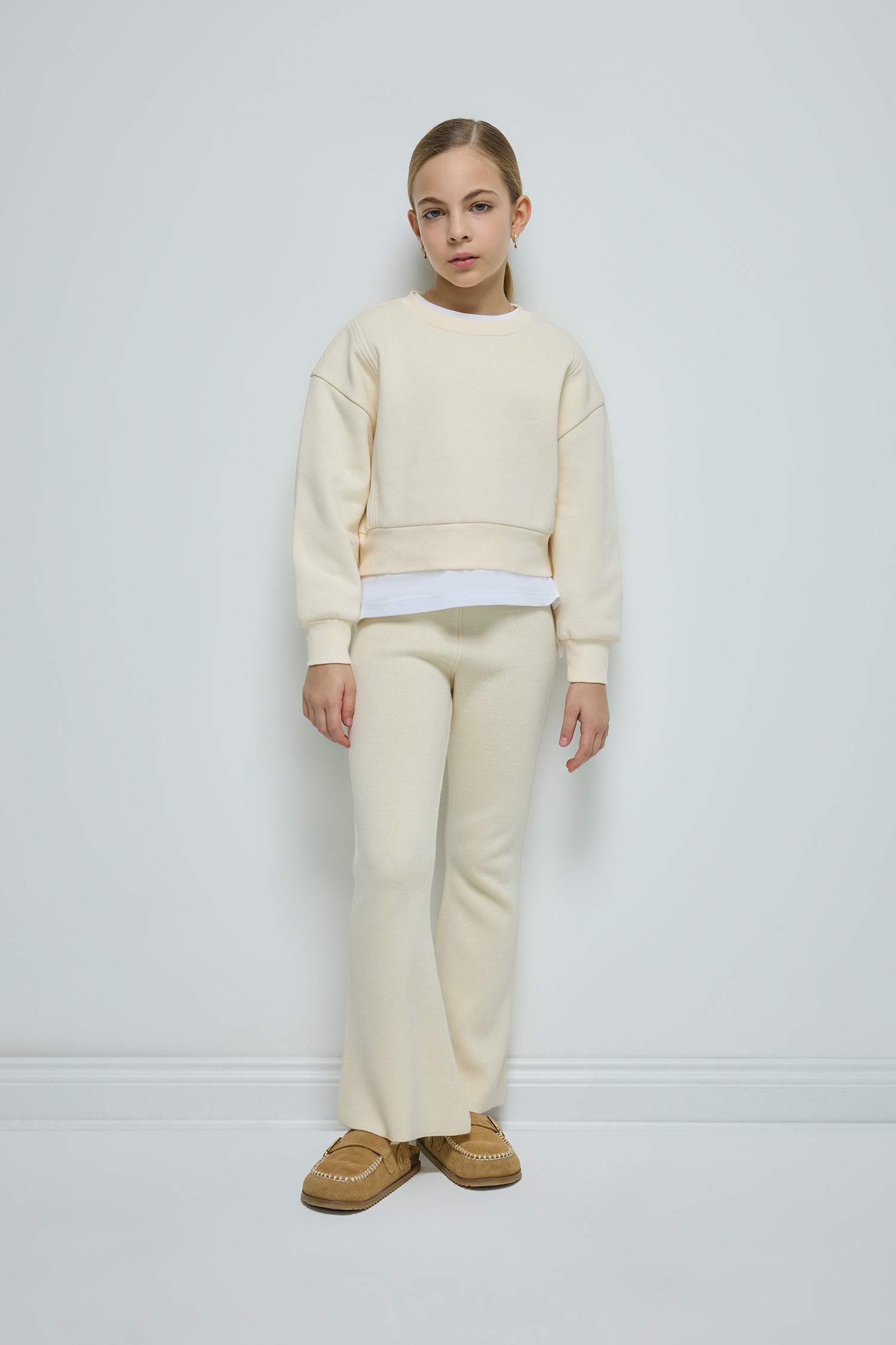 سويت شيرت بيزك قصة مريحة بياقة مستديرة ببطانة ناعمة