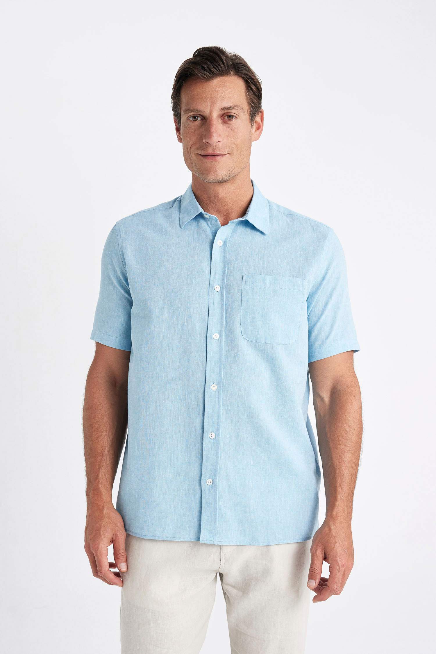 قميص بولو كتان ازرق نص كم قصة عادية