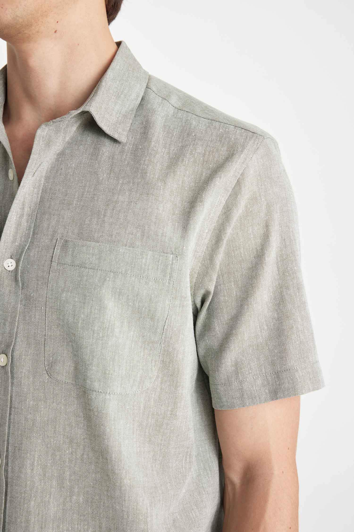 قميص بولو كتان نص كم قصة عادية