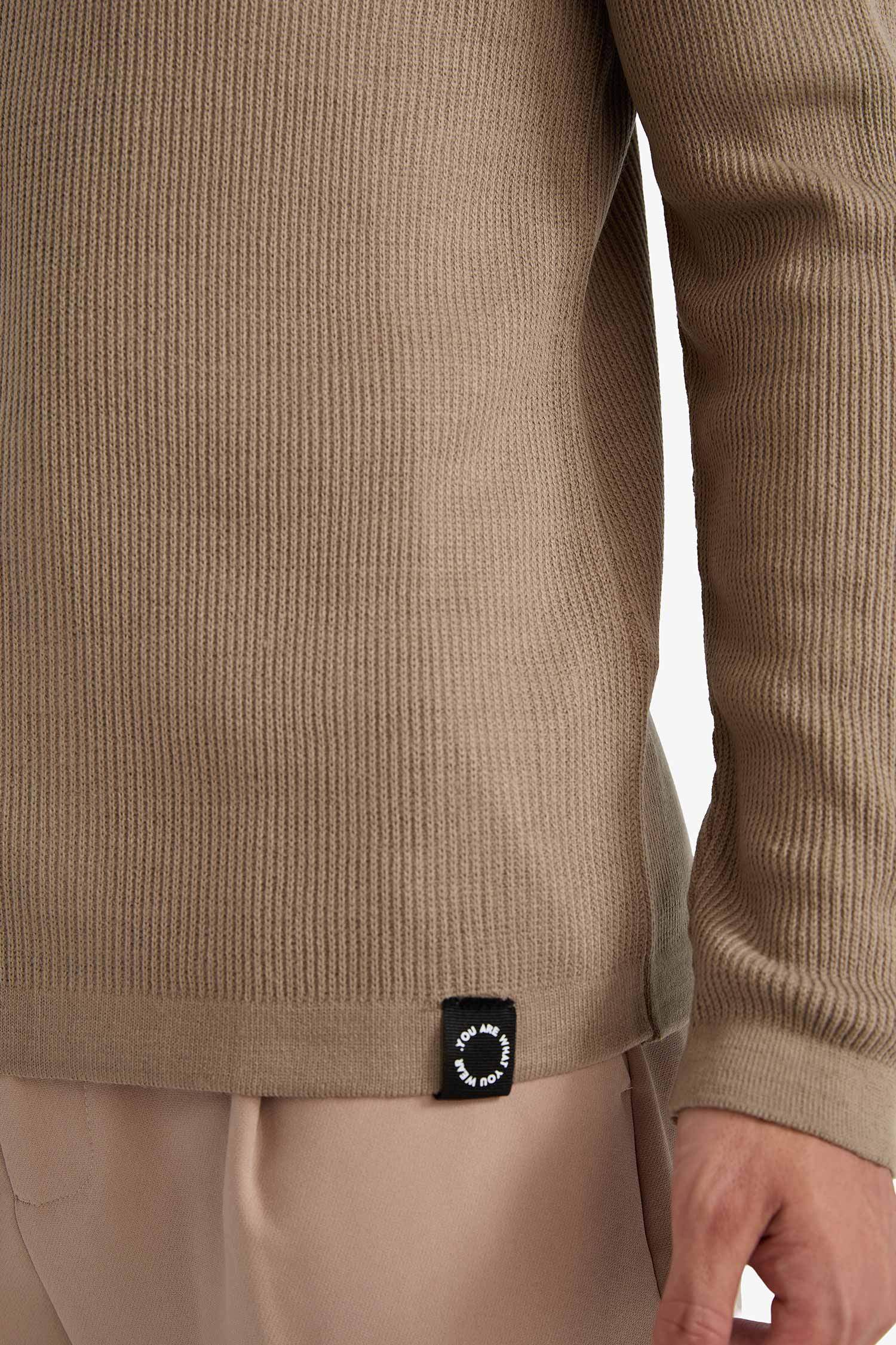 بلوفر تريكو قصة مريحة بياقة مستديرة