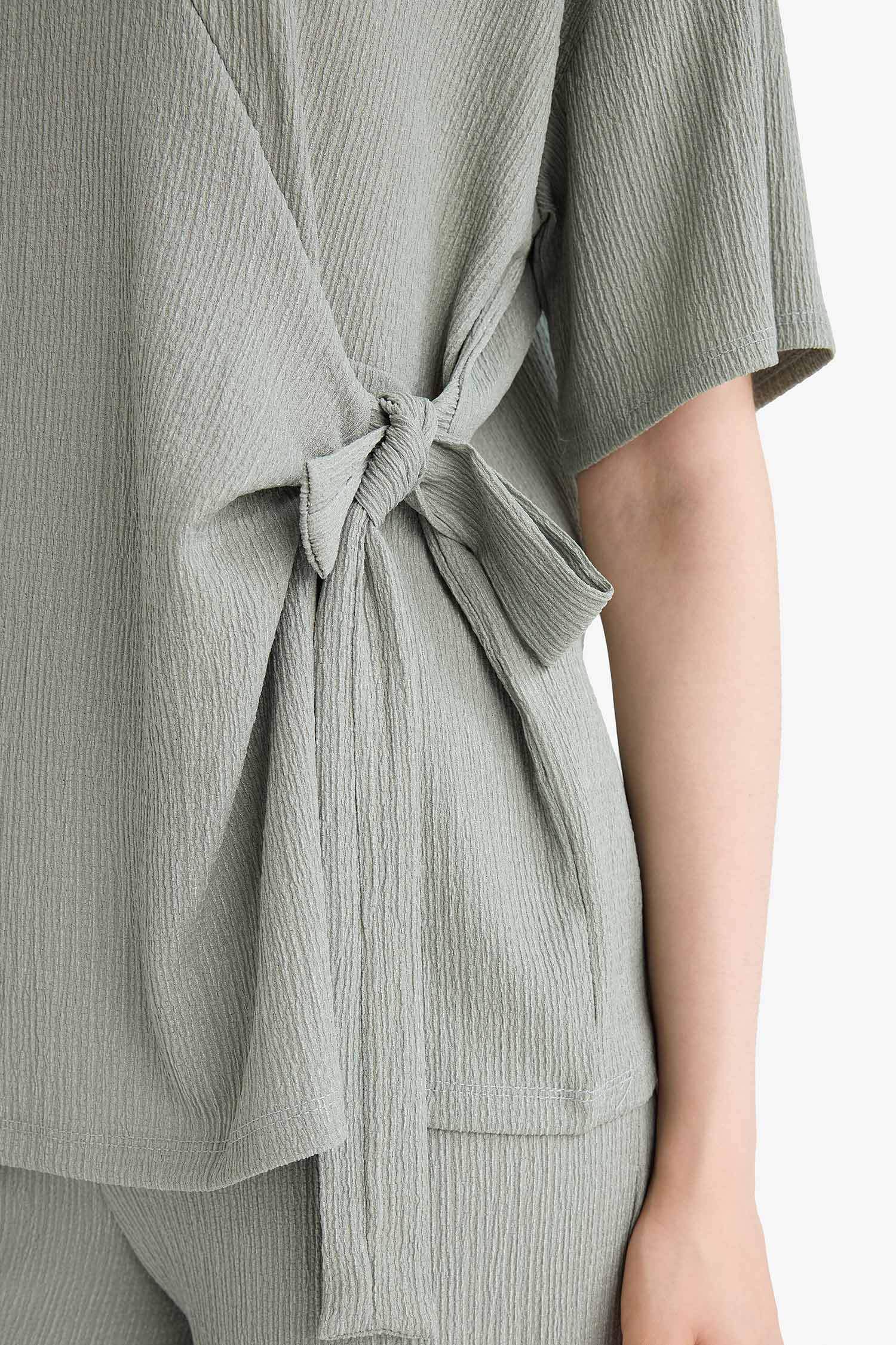 تيشيرت نص كم قصة مريحة بياقة مستديرة