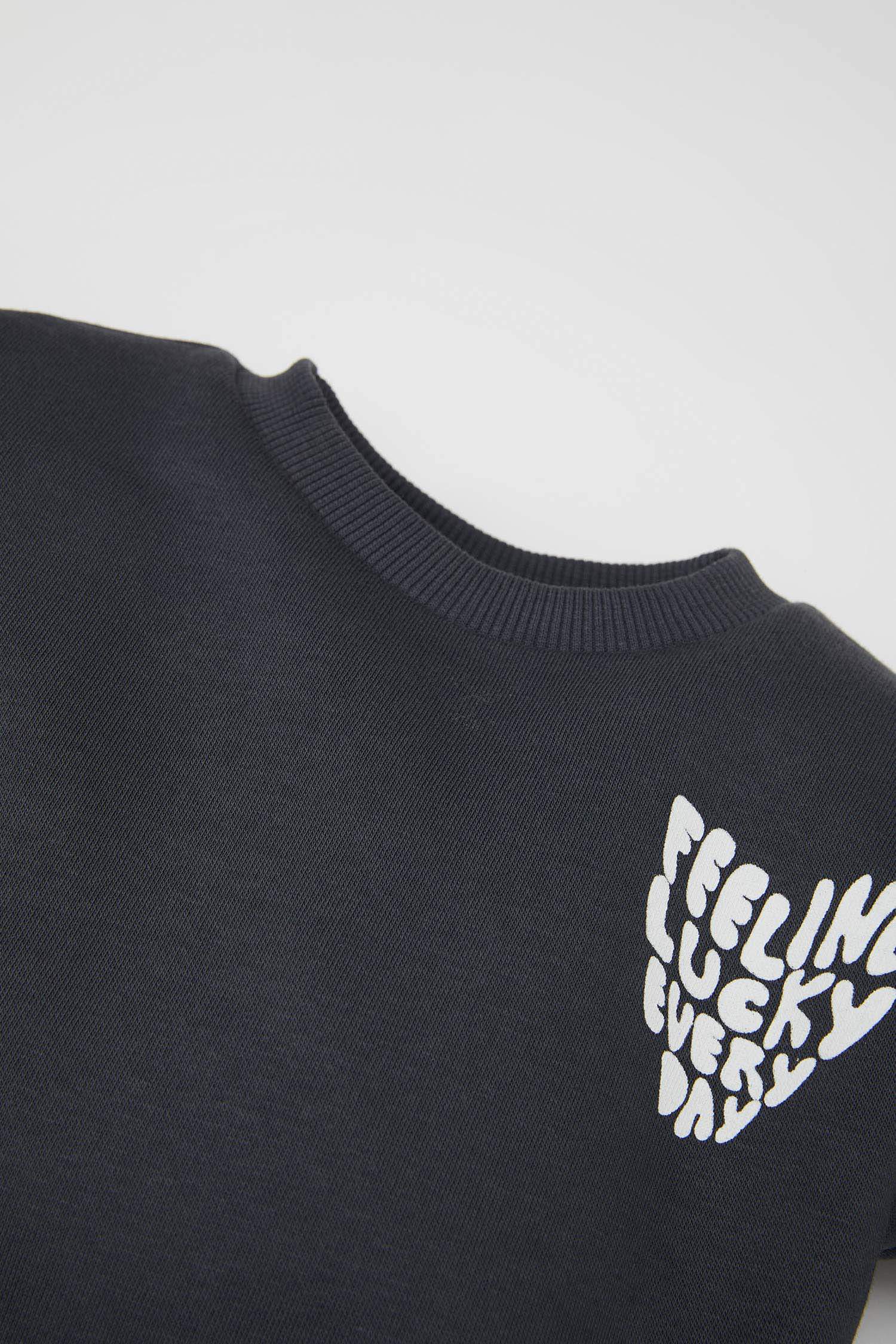 فستان سويت بناتي كاروهات بطبعة شعار كم طويل