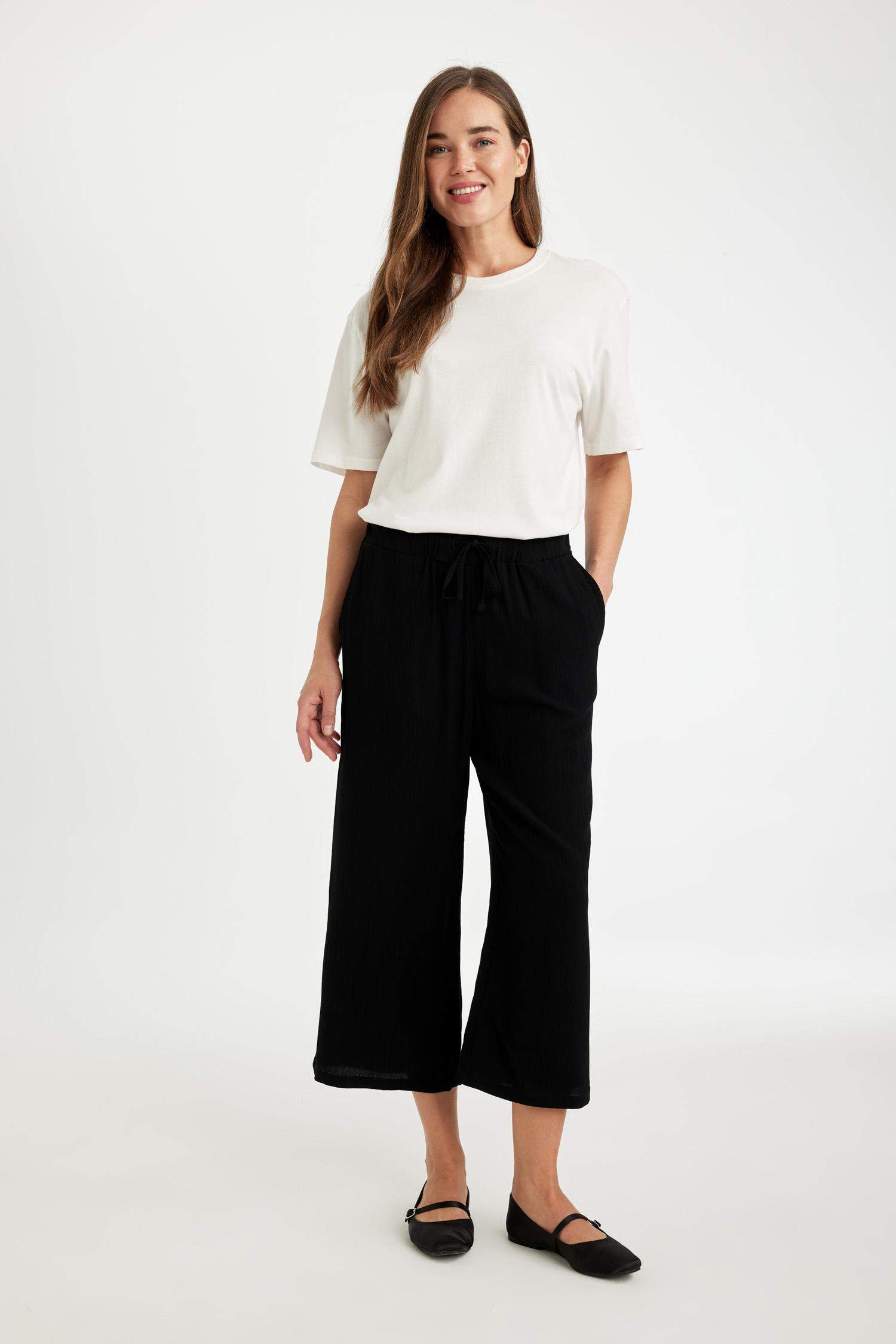 بنطلون كابري كروب فيت قصة عادية