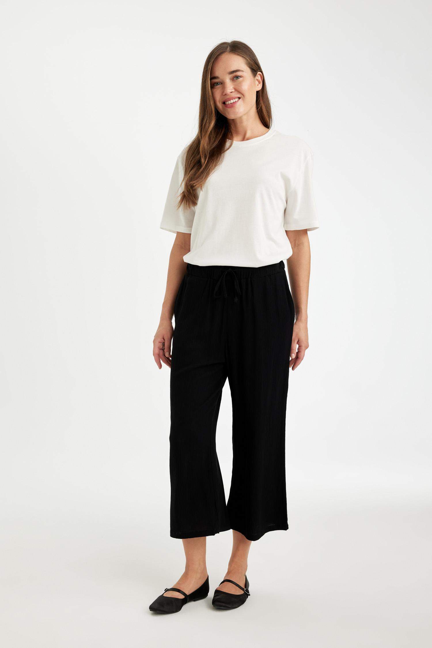 بنطلون كابري كروب فيت قصة عادية