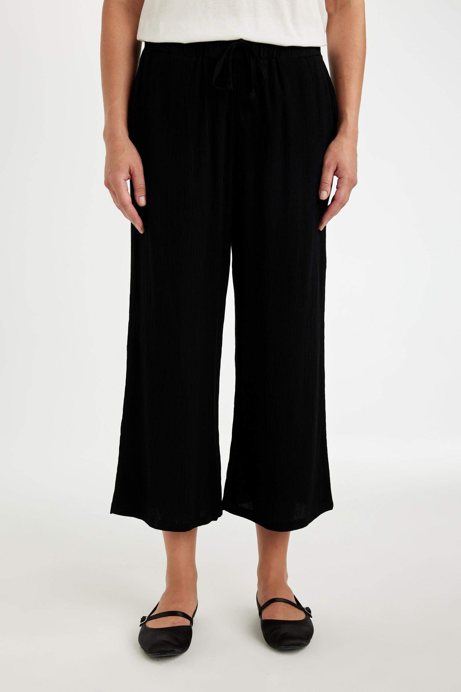 بنطلون كابري كروب فيت قصة عادية