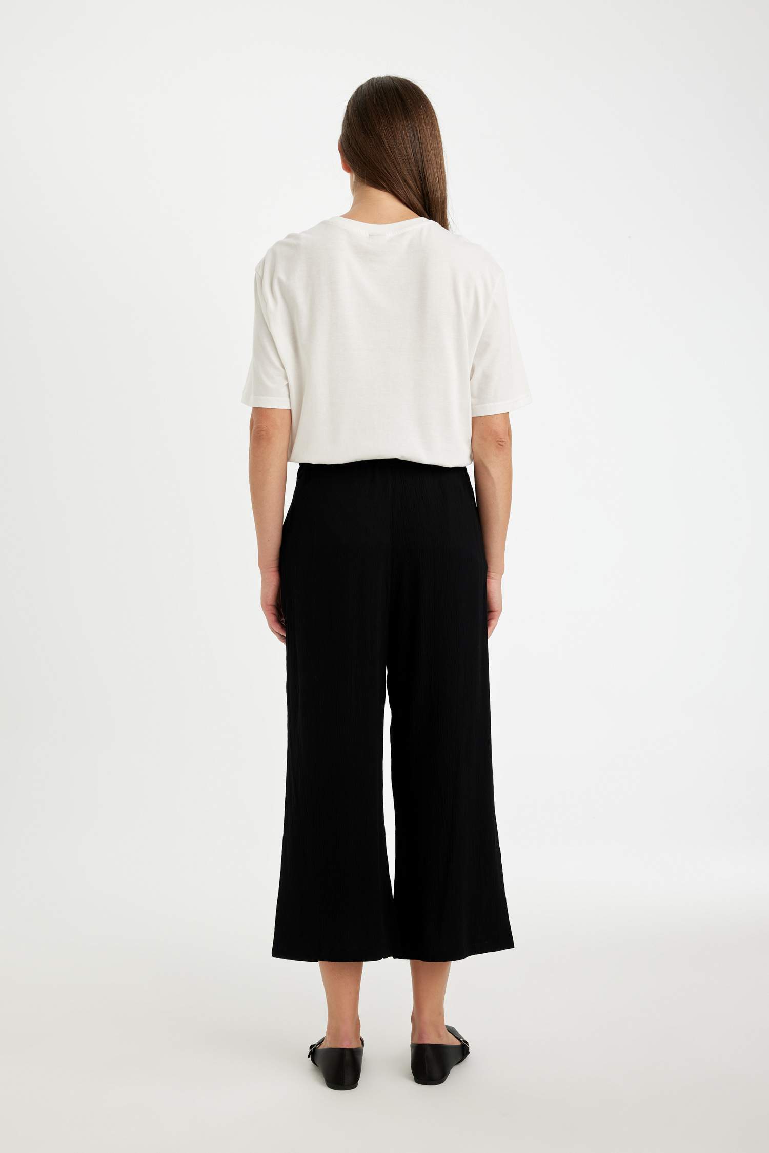 بنطلون كابري كروب فيت قصة عادية