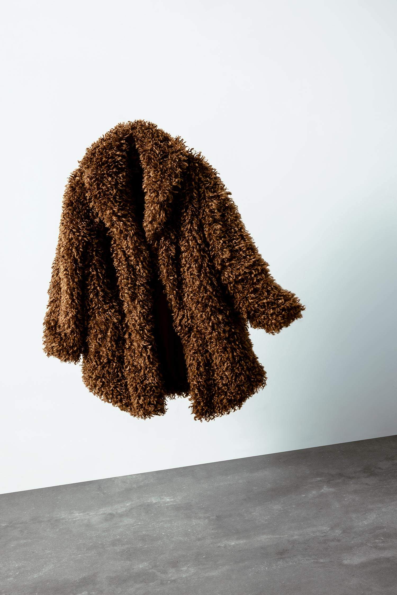 جاكيت فرو صناعي طويل قصة عادية بجيب