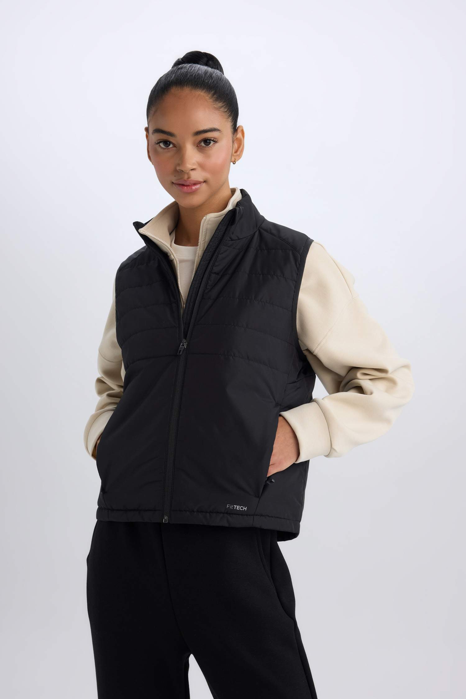 يلك نفخ رياضي قصة عادية بجيب مقاوم للماء من DeFactoFit