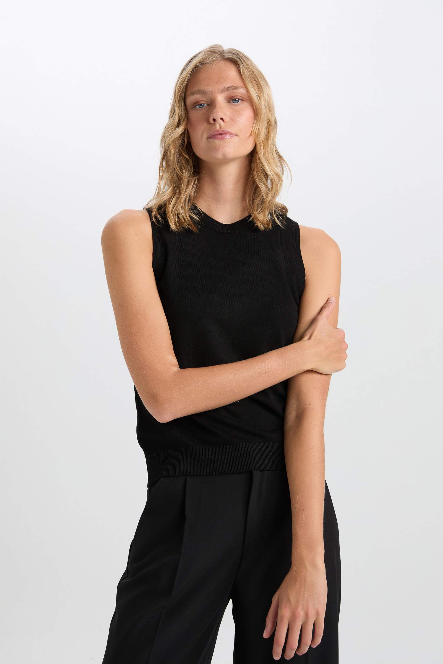 Pull sans manches slim basique en tricot à col rond