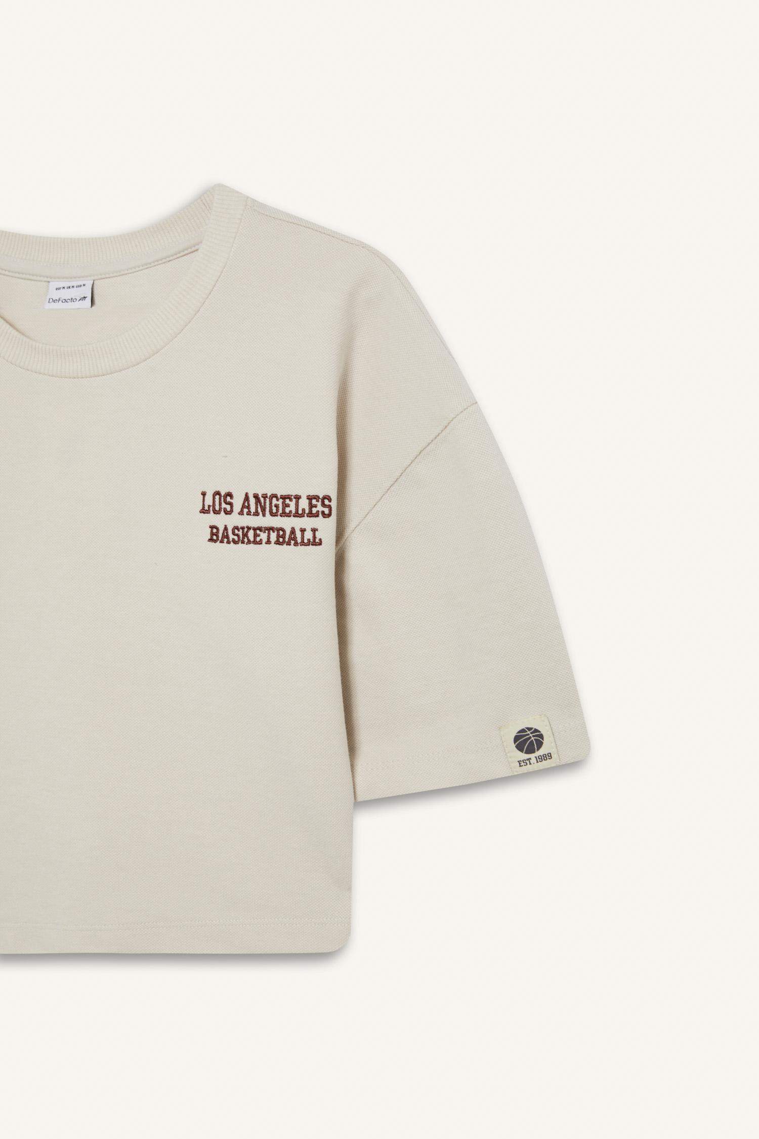 DeFactoFit Bisiklet Yaka Spor Baskılı Sporcu Pike Kısa Kollu Tişört