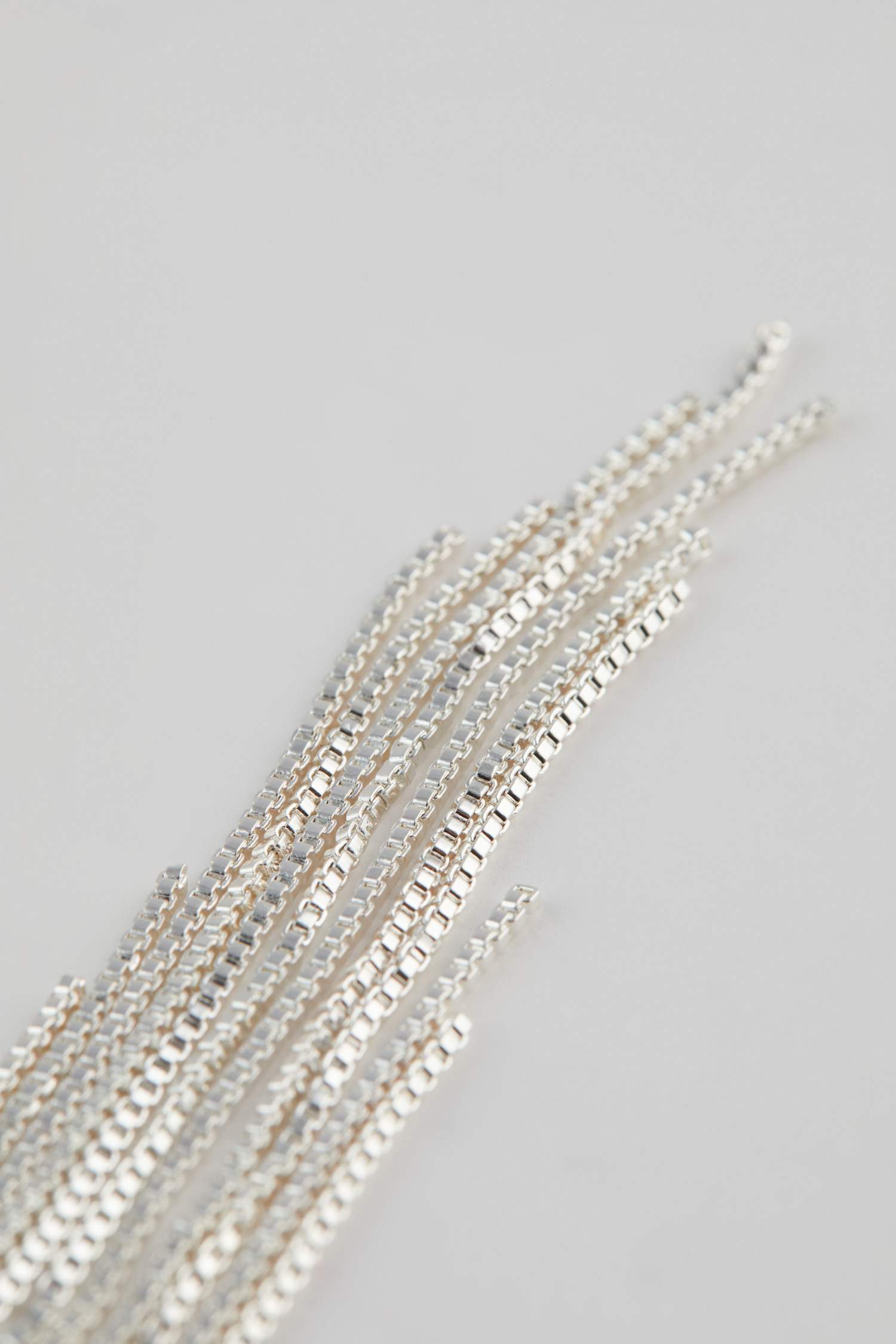 تراجي نسائي فضي