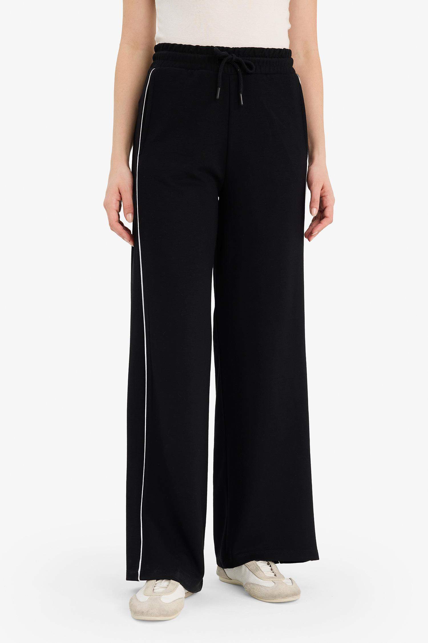 بنطرون قصة مستقيمة برجل عادي