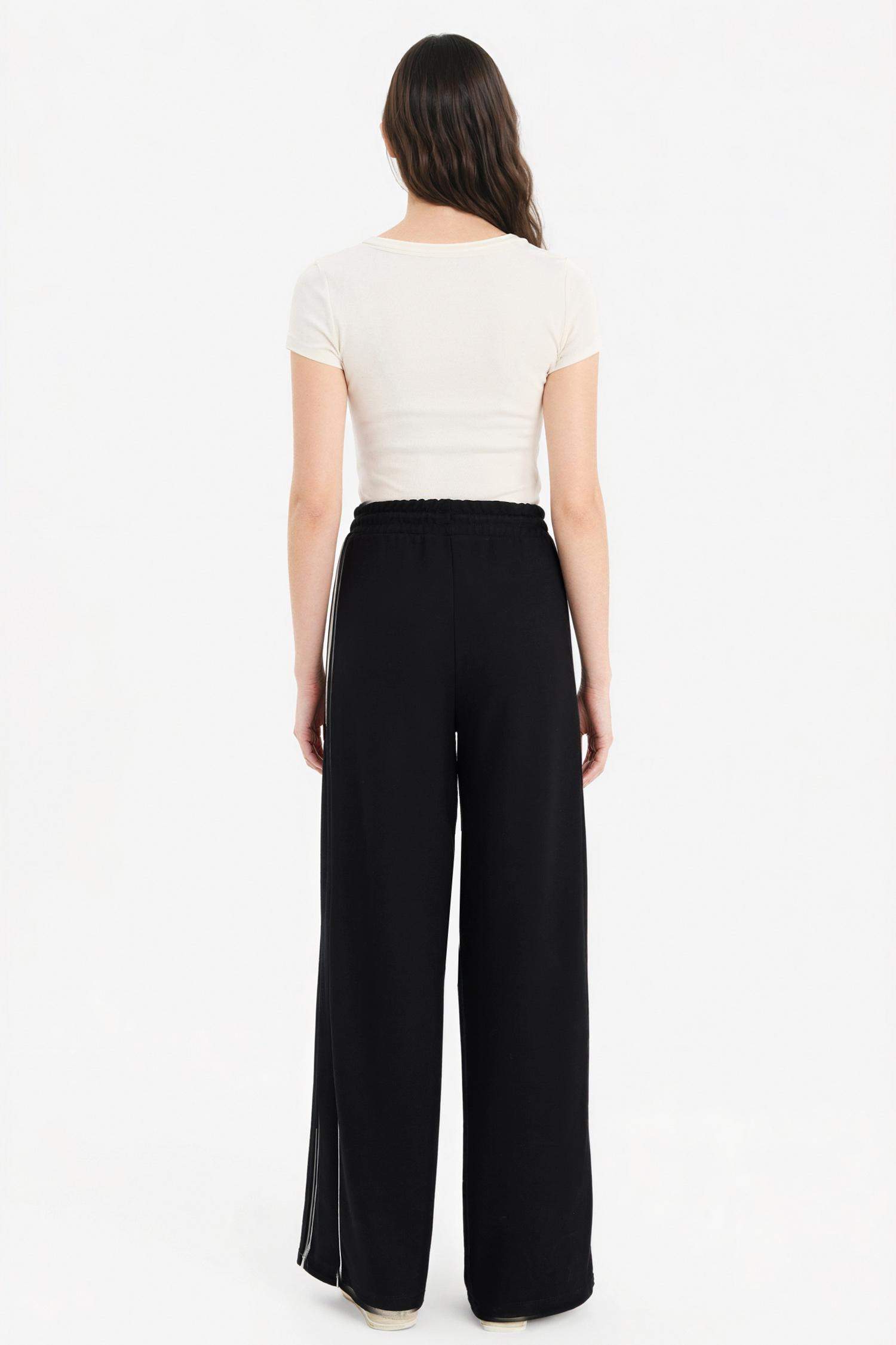 بنطرون قصة مستقيمة برجل عادي