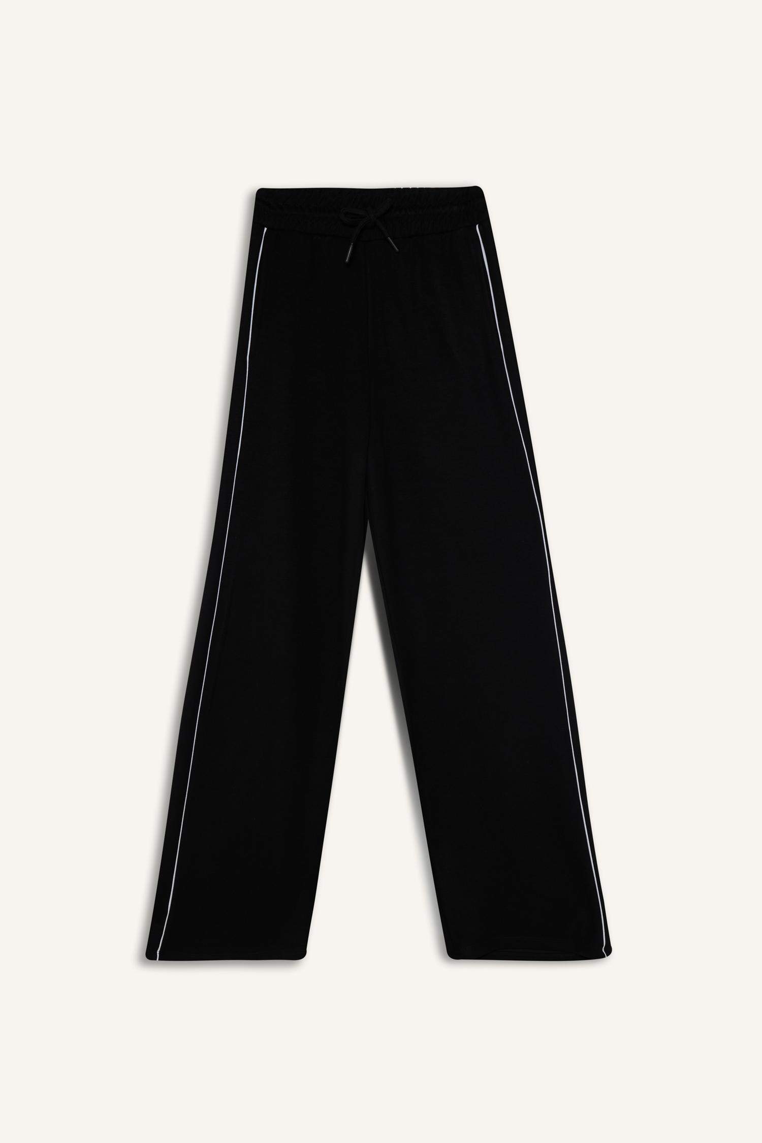 بنطرون قصة مستقيمة برجل عادي