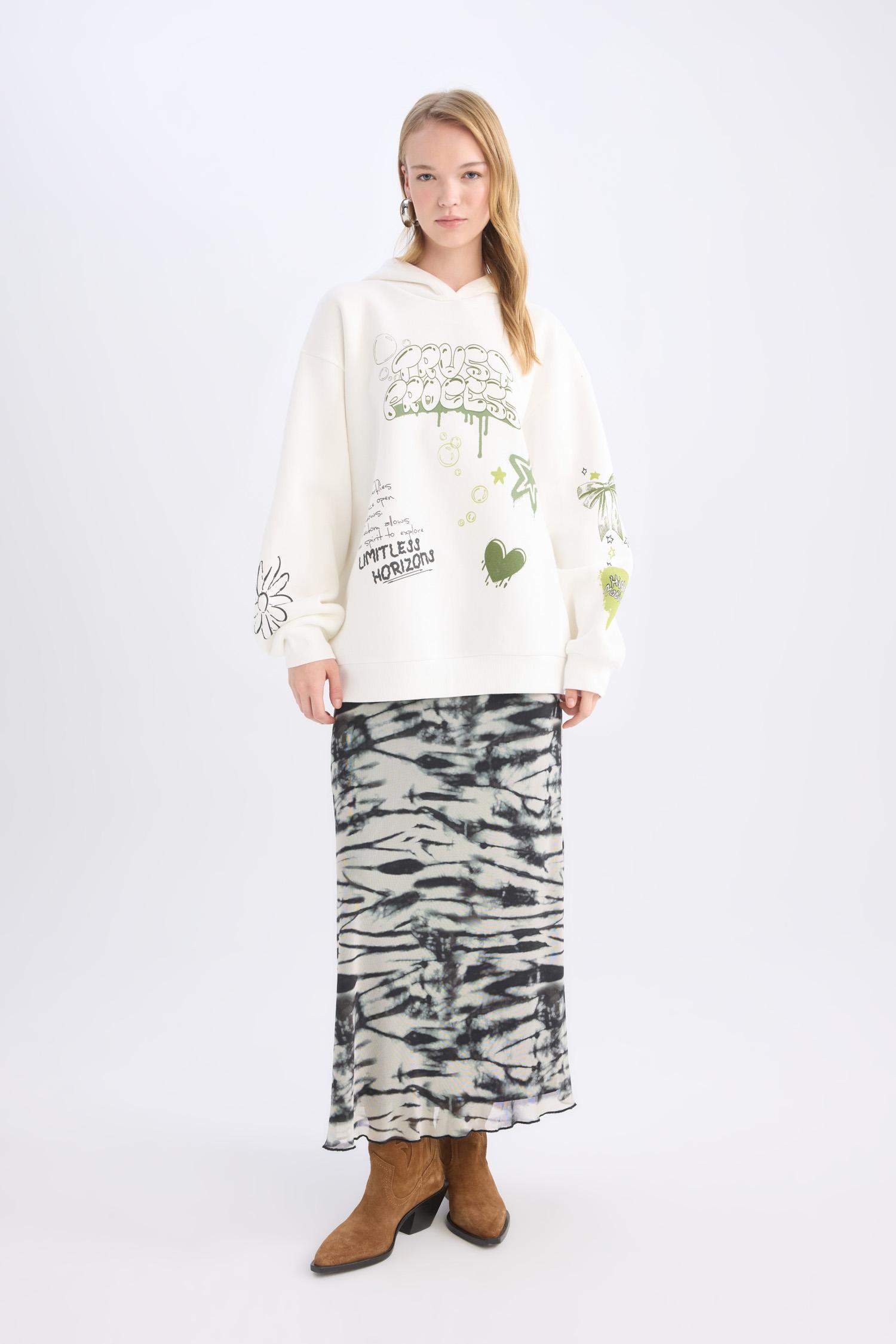 Sweat à capuche oversize avec un imprimé dans le dos