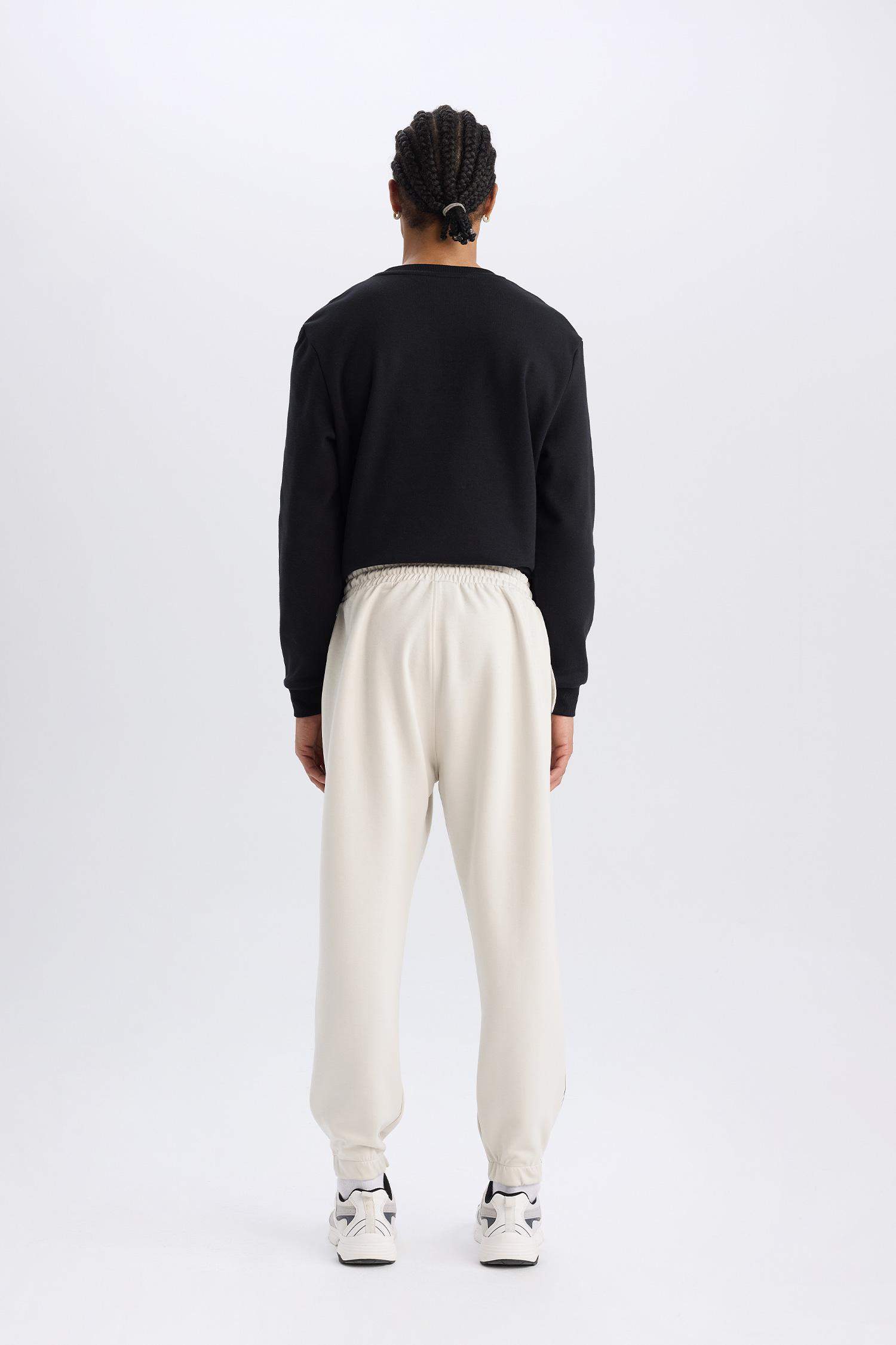 DeFactoFit NBA Milwaukee Bucks Jogger Eşofman Altı Standart Fit Cepli Esnek Bantlı Paça Skuba Dalgıç Kumaş 