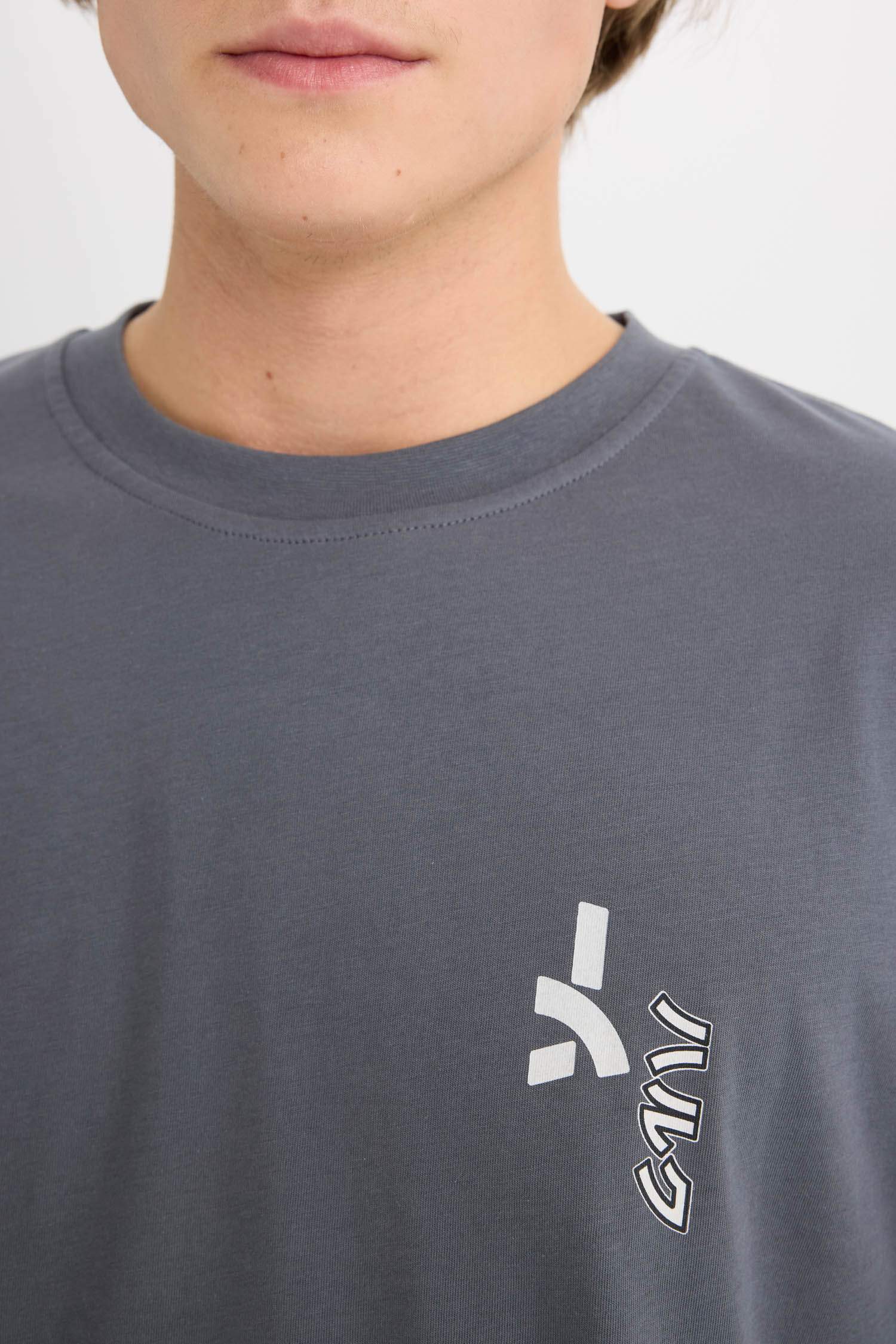 %100 Pamuk Marvel Boxy Fit Bisiklet Yaka Sırt Baskılı Kısa Kollu Tişört