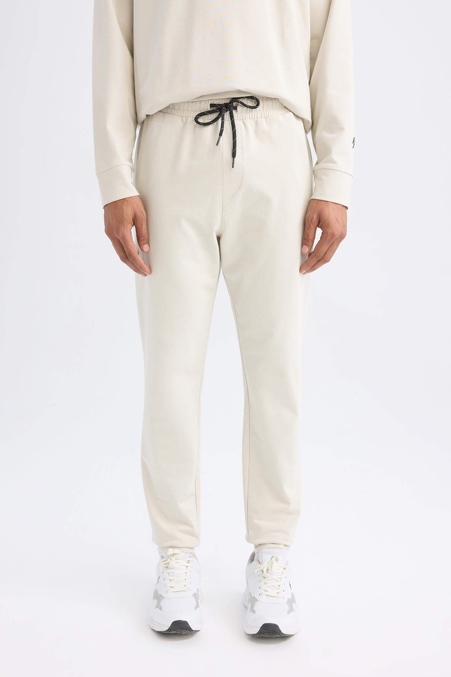 Sporcu Jogger Eşofman Altı Slim Fit Dar Kesim Standart Paça Beli Paçası Lastikli