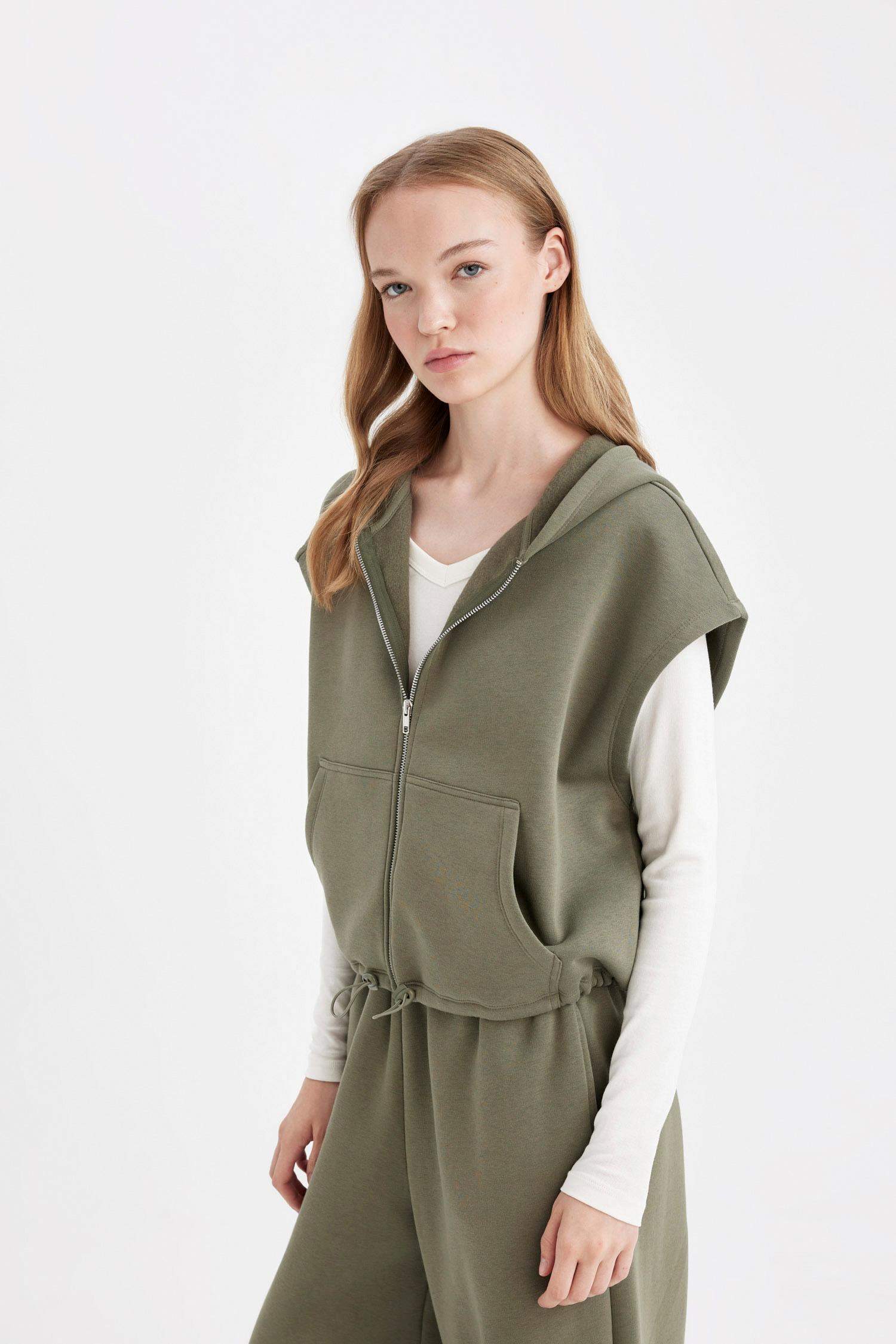 كارديجان سويت قصة فضفاضة بدون كم بسوسته