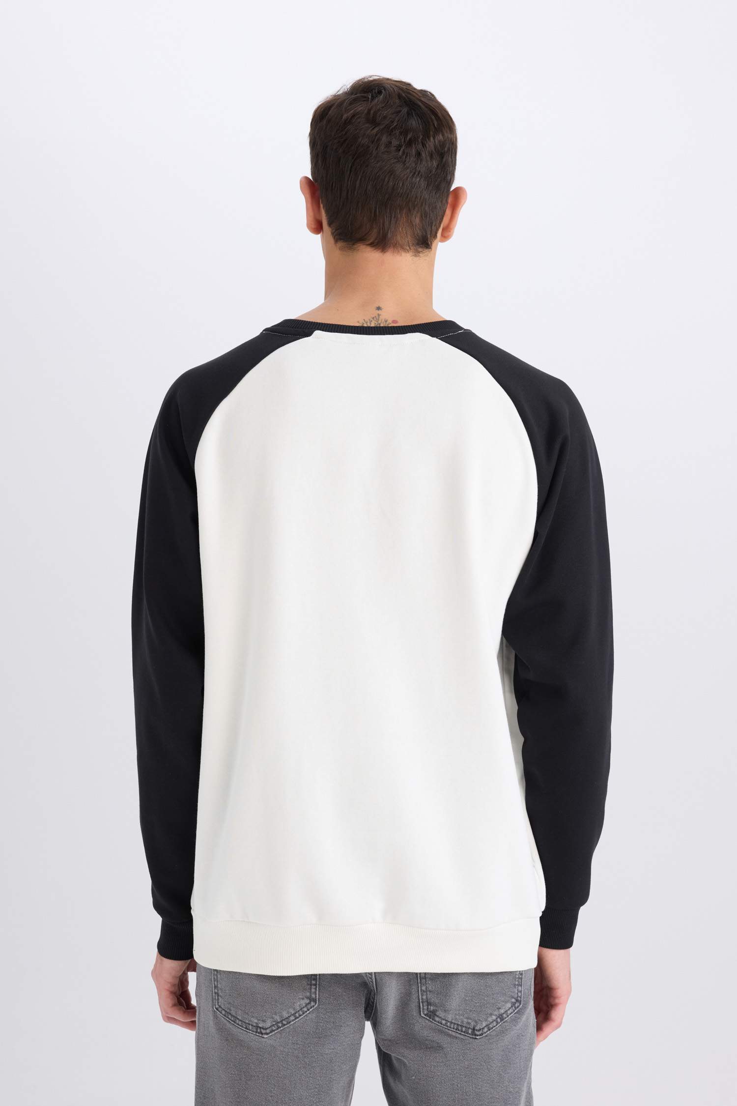 سويت شيرت اوفر سايز مطبوع بياخة مستديرة