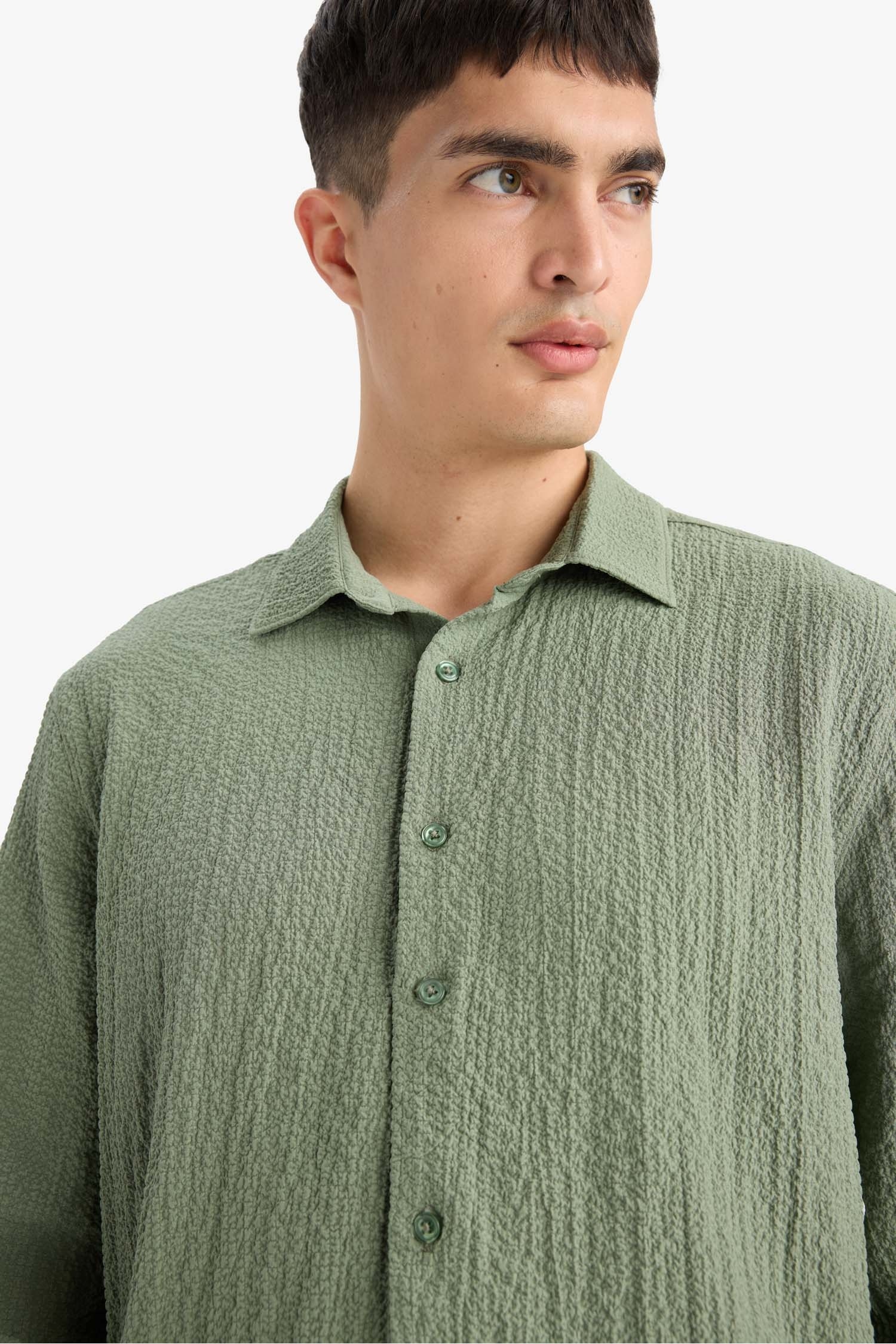 قميص بولو ردن طويل منسوج مودرن فيت