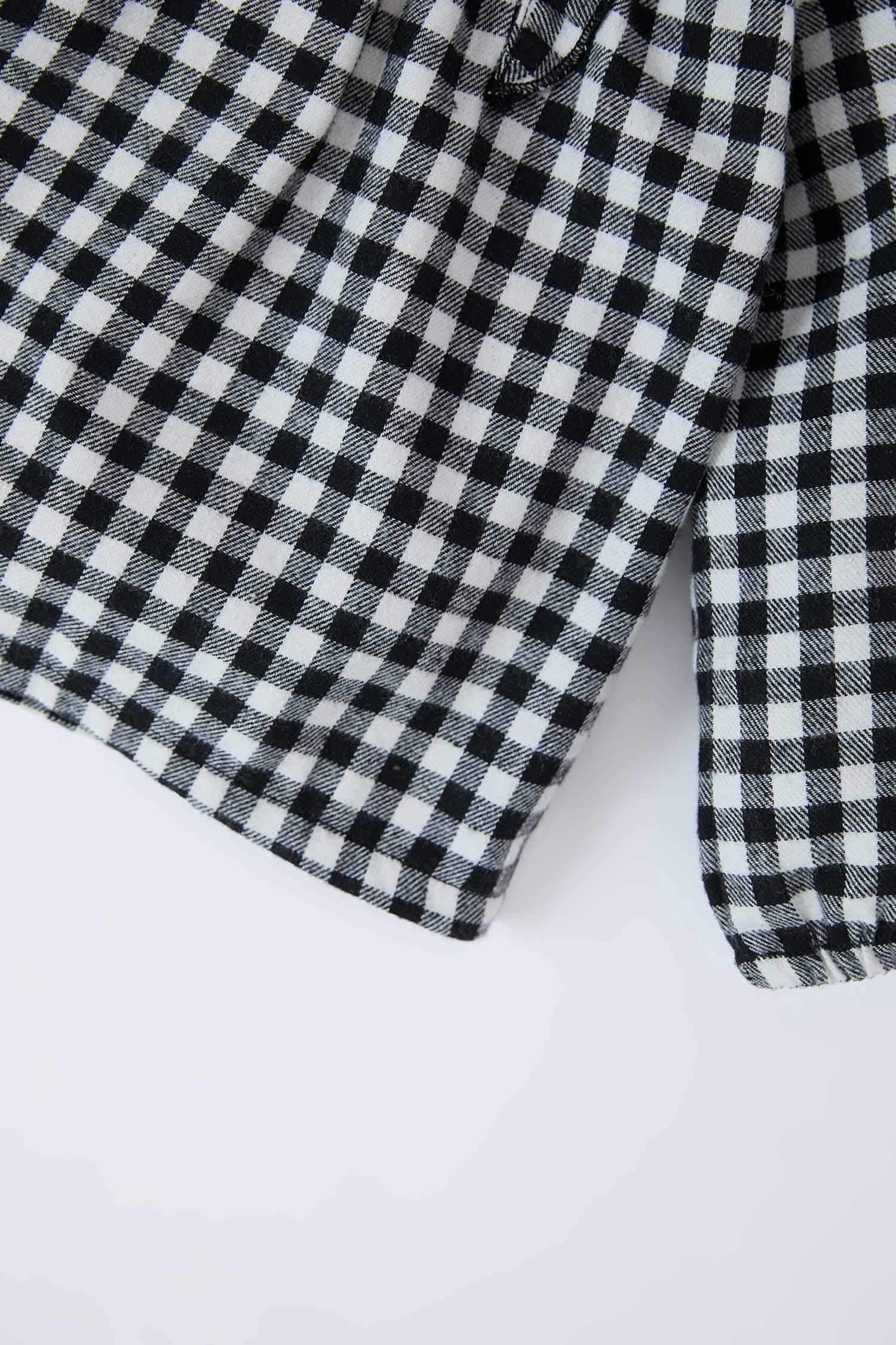 طقم من قطعتين بلوزة كارو برقبة مستديرة و سروال ضيق للبيبي بنت