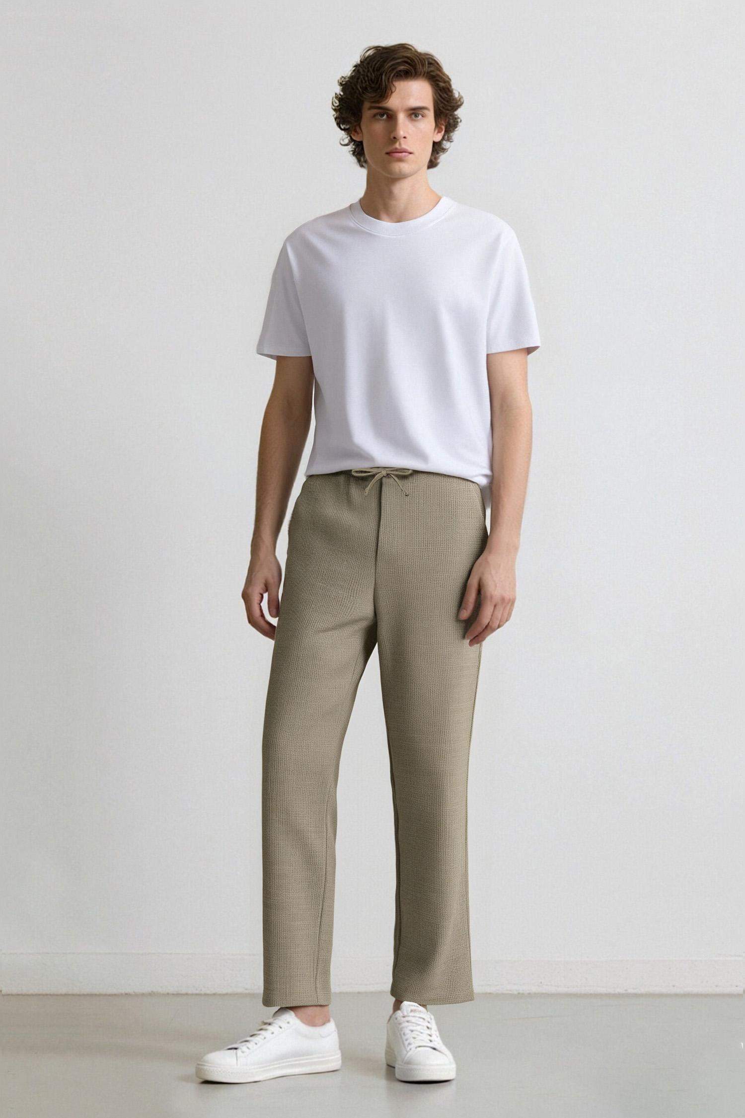 Брюки с широкими штанинами и тремя карманами