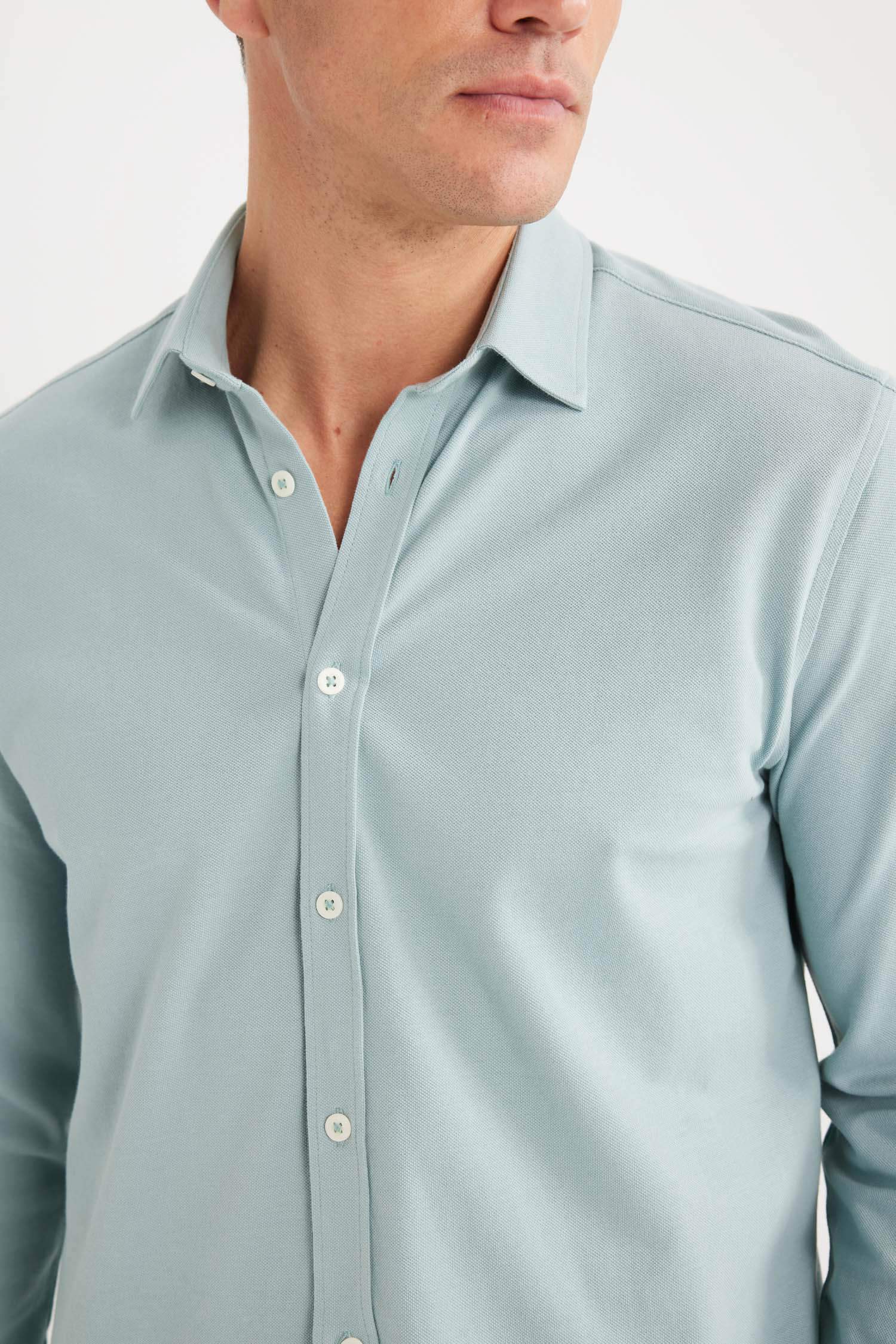 قميص كم طويل محبوك قصة عادية بياقة بولو