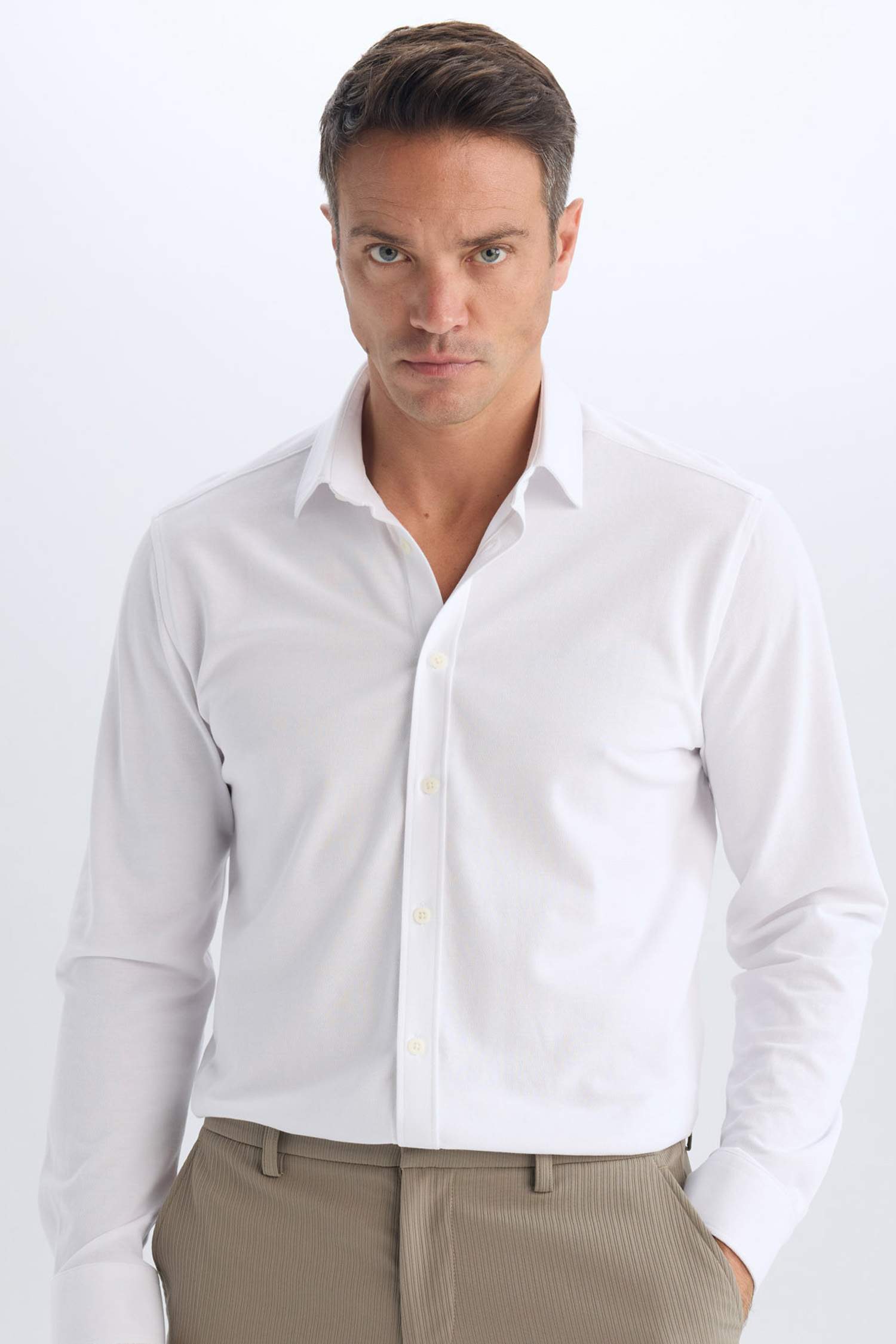 قميص بولو كم طويل محبوك قصة عادية